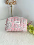 Pink Quilted Toiletry Bag with Zipper with white flower print