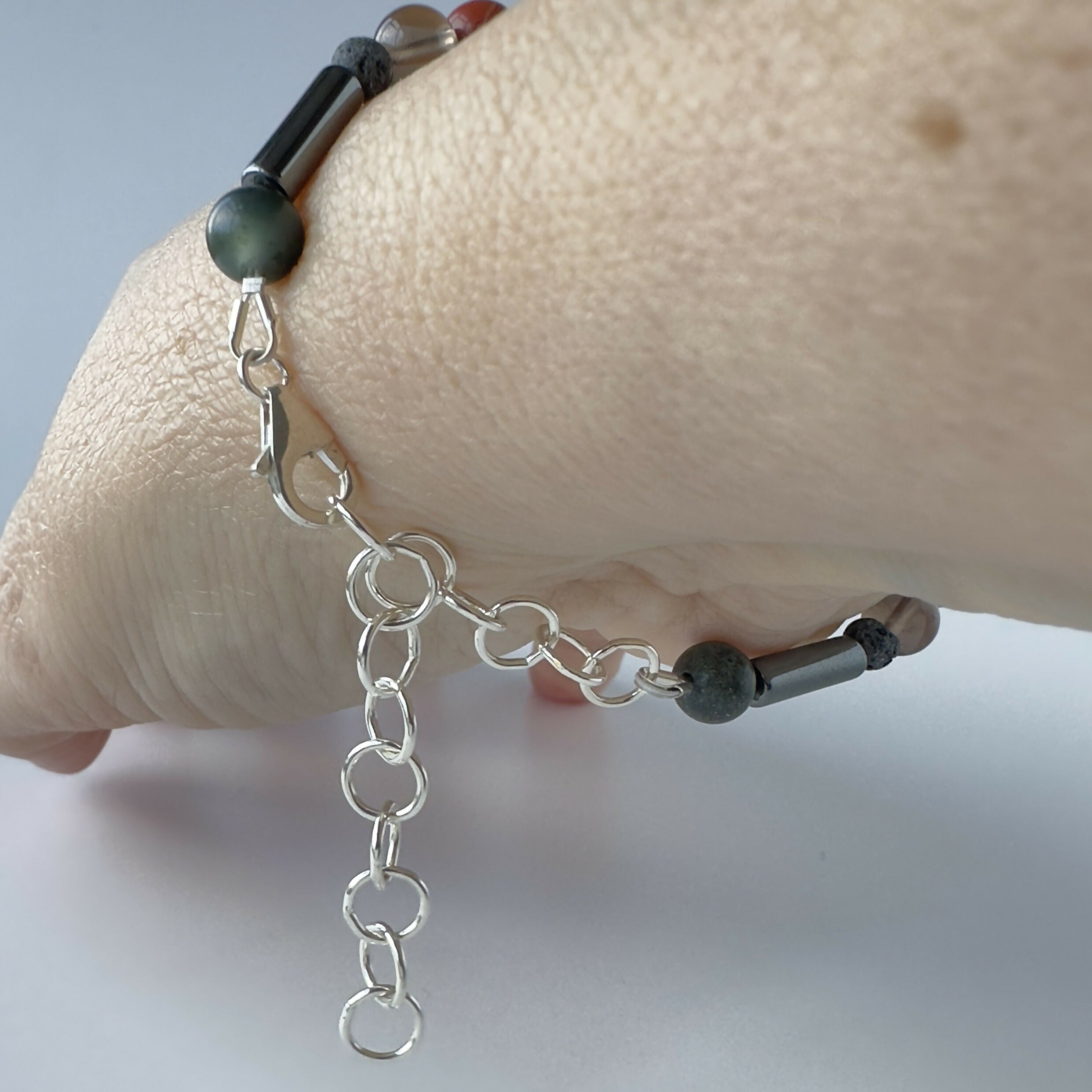 UNISEX HEALING CRYSTAL & STERLING SILVER ROOT CHAKRA BRACELET WITH AROMATHERAPY BEADS