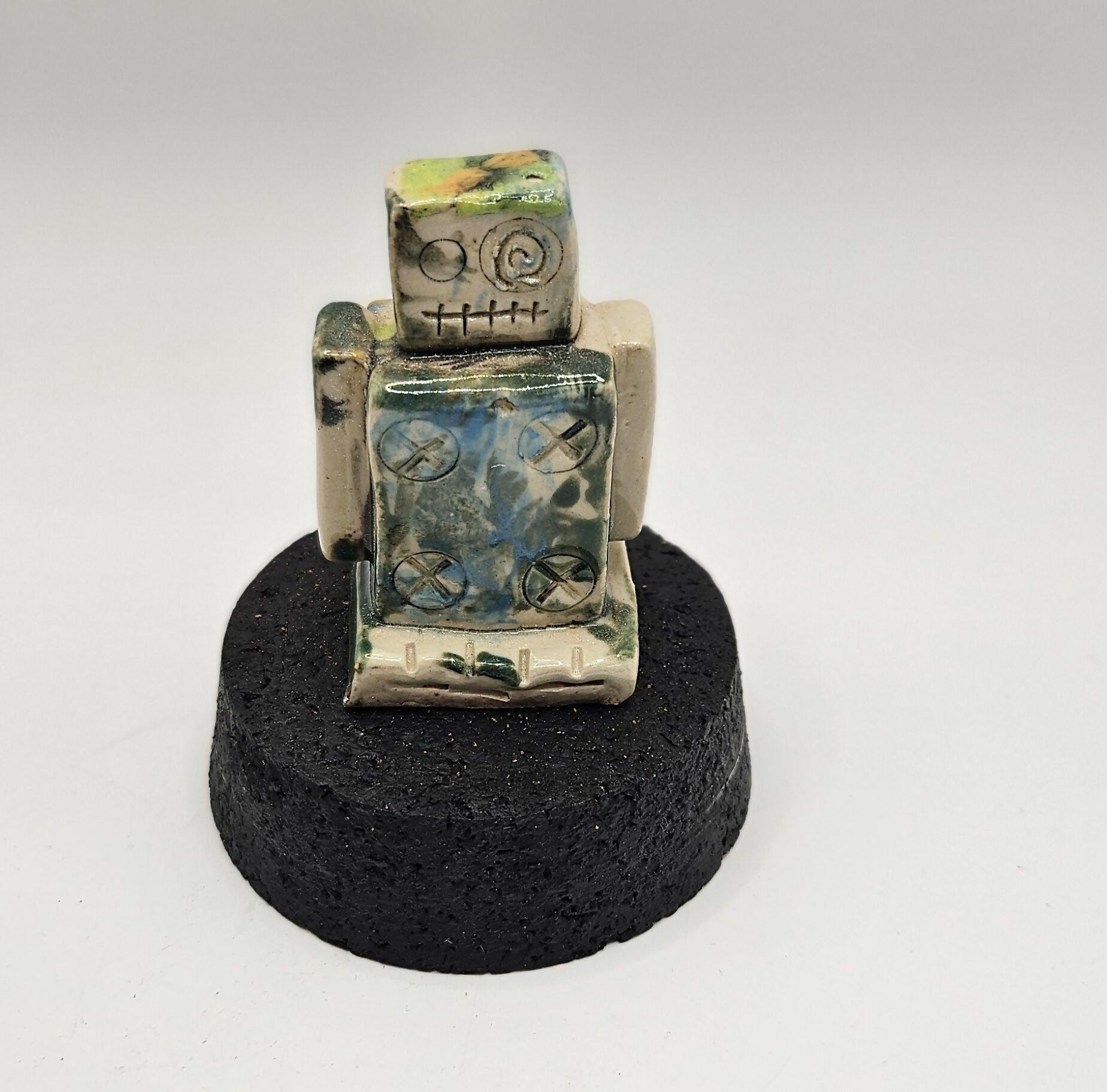 QUIKRY CERAMIC 'MINIBOTS' IN A GLASS CLOCHE