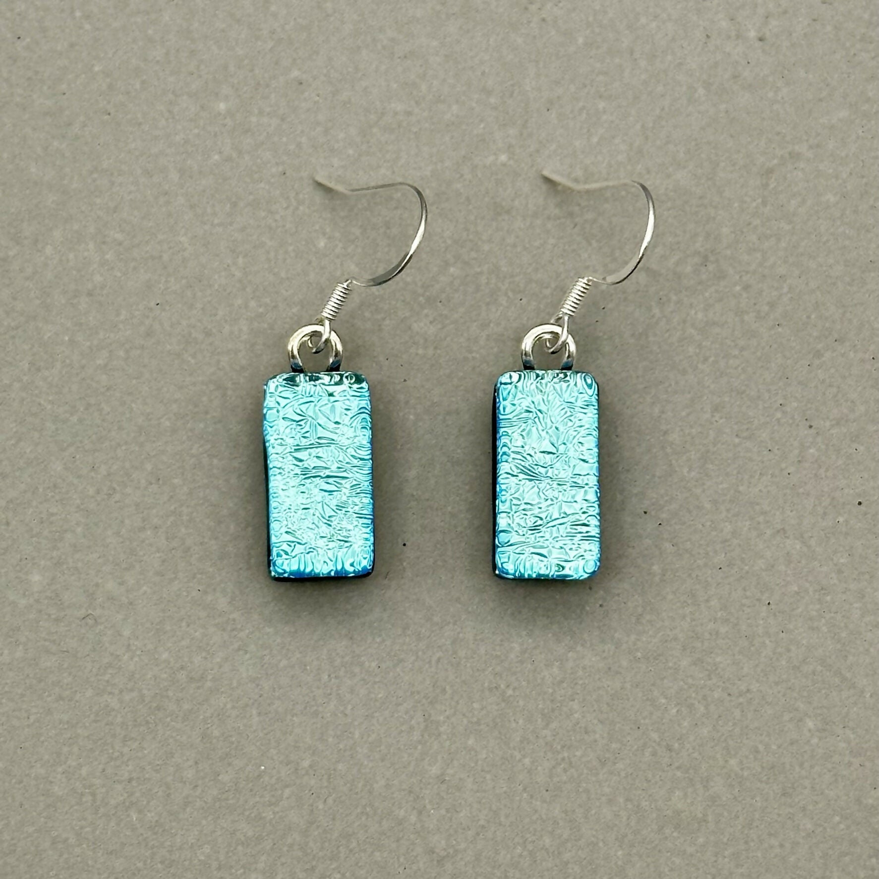 Ice Blue Dichroic Fused Glass Dangle Sterling Silver Earrings - Handmade by Jade Tapson Glass.