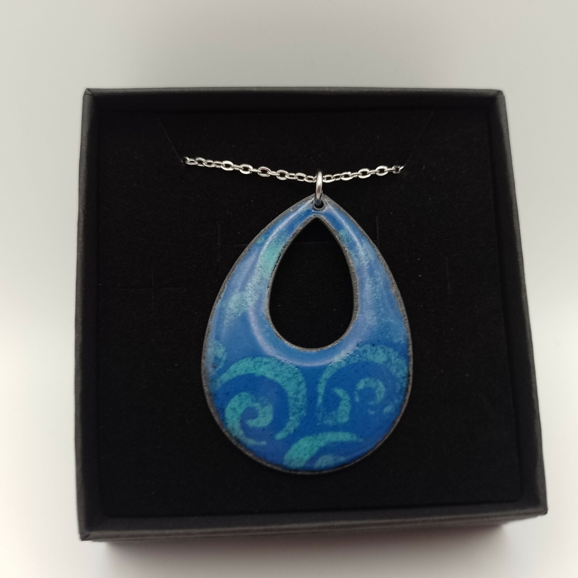 Dark Blue Enamel Pendant with Pale Blue Swirl Pattern