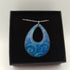 Dark Blue Enamel Pendant with Pale Blue Swirl Pattern