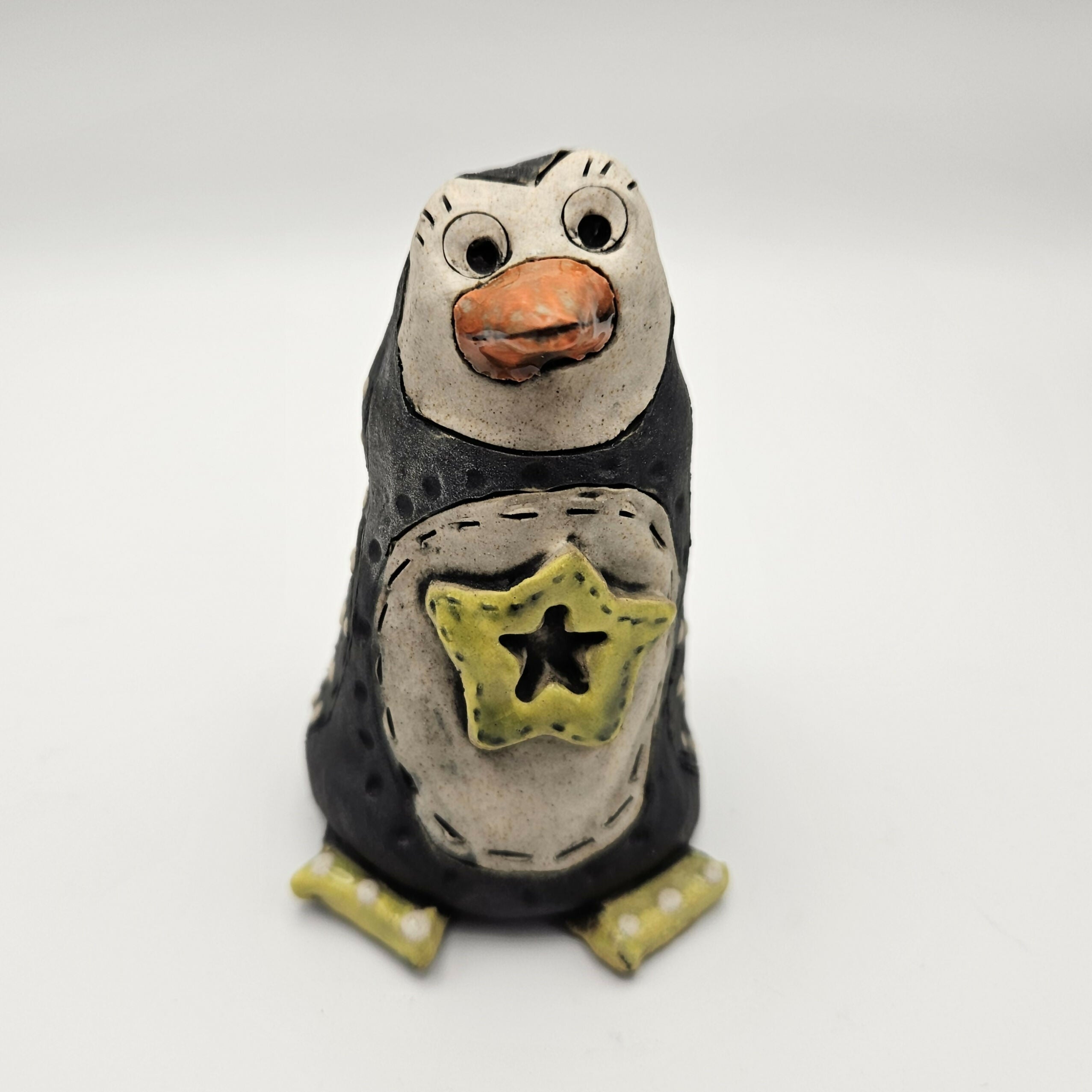 CHARMING CERAMIC PENGUIN.