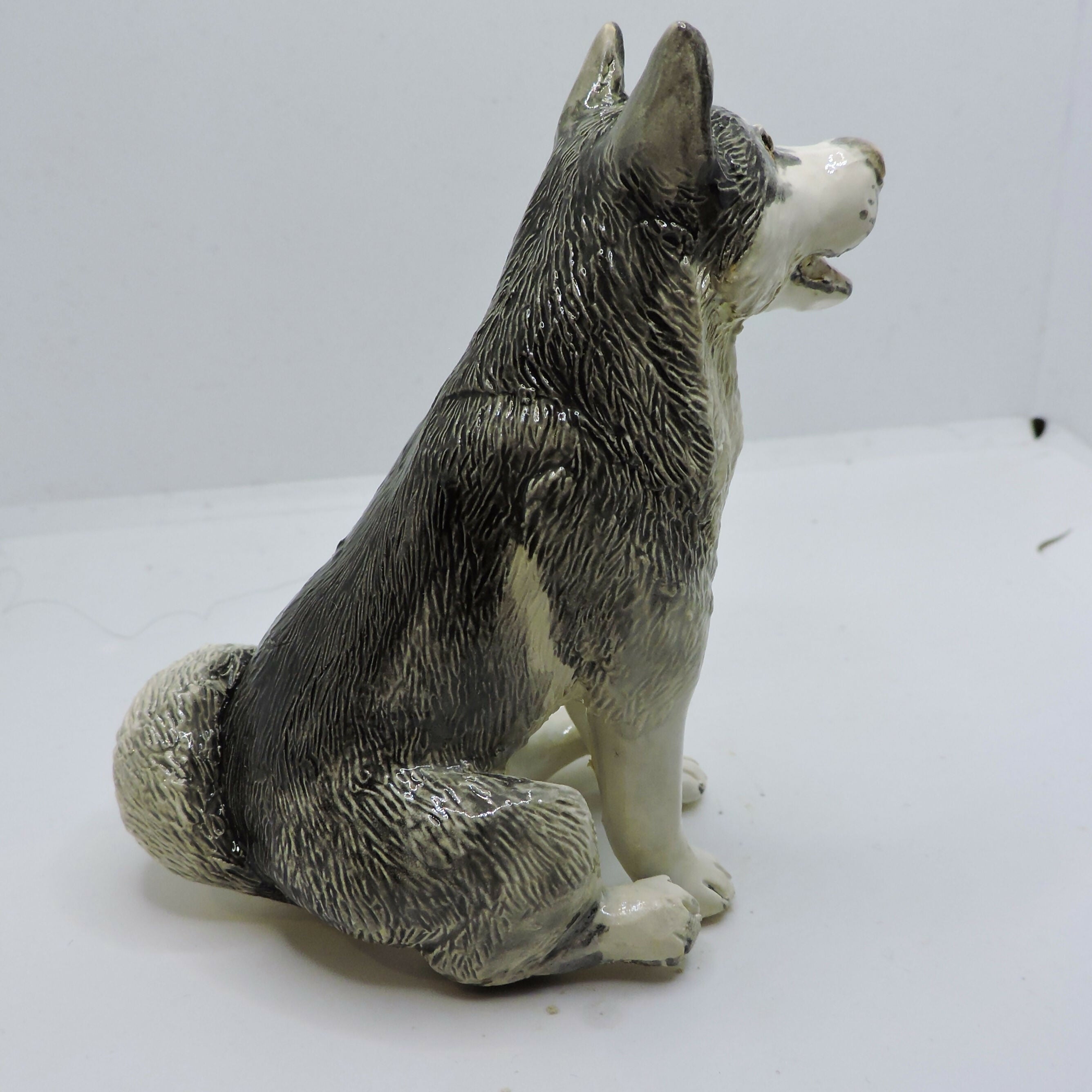 Ceramic Husky dog sculpture