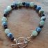 Gemstone Bracelet with a Tibetan Silver Toggle Catch, Banded Green Agate, Blue Spotted Jasper and Faceted Navy Goldstone.