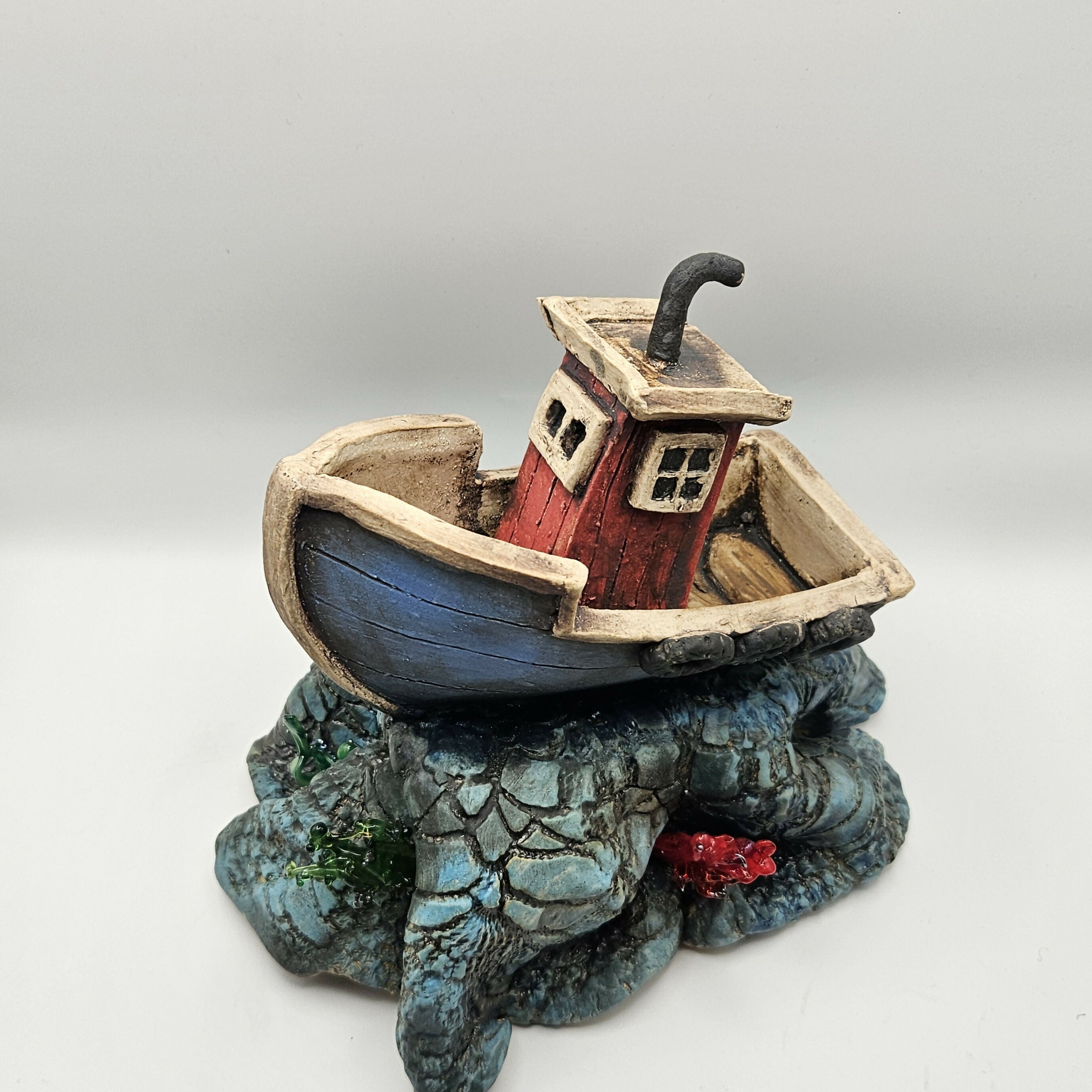 'SEAS THE DAY' CERAMIC BOAT ON WAVES WITH GLASS ELEMENTS