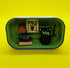Black Cat with Books and Picture in a Tin