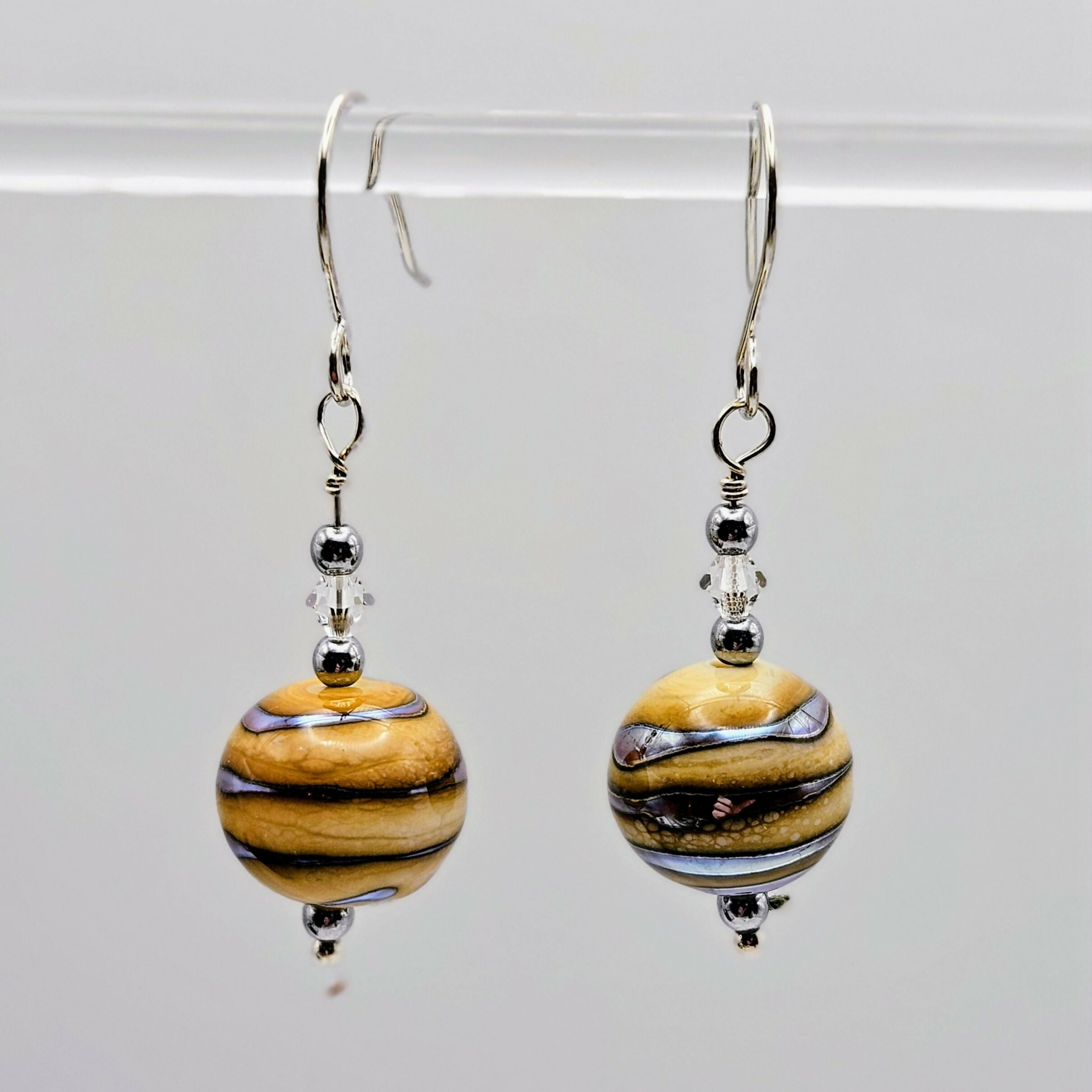 HAND LAMPWORKED GLASS ROUND EARRINGS, WITH DICHROIC GLASS,STERLING SILVER AND SWAROVSKI CRYSTALS.
