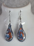 Handcrafted Teardrop Earrings With Blue, Silver And Red Colours