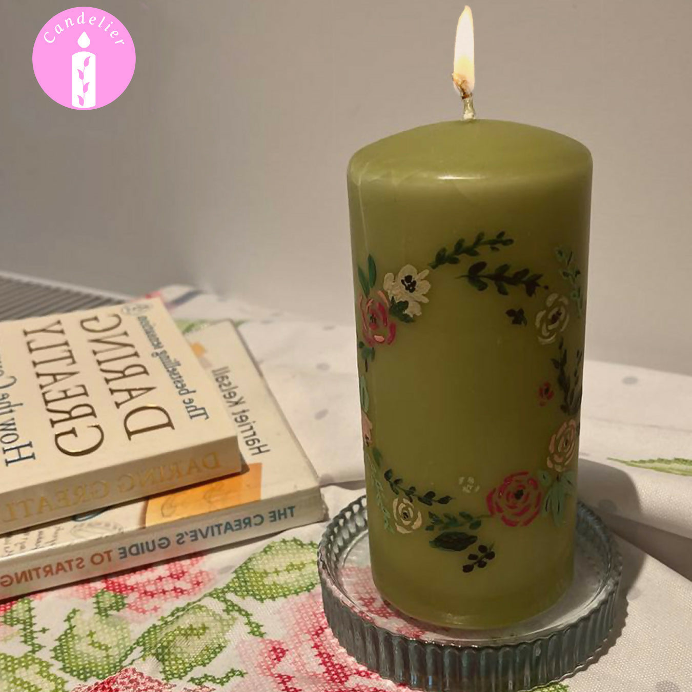 Green Candle With Floral Design