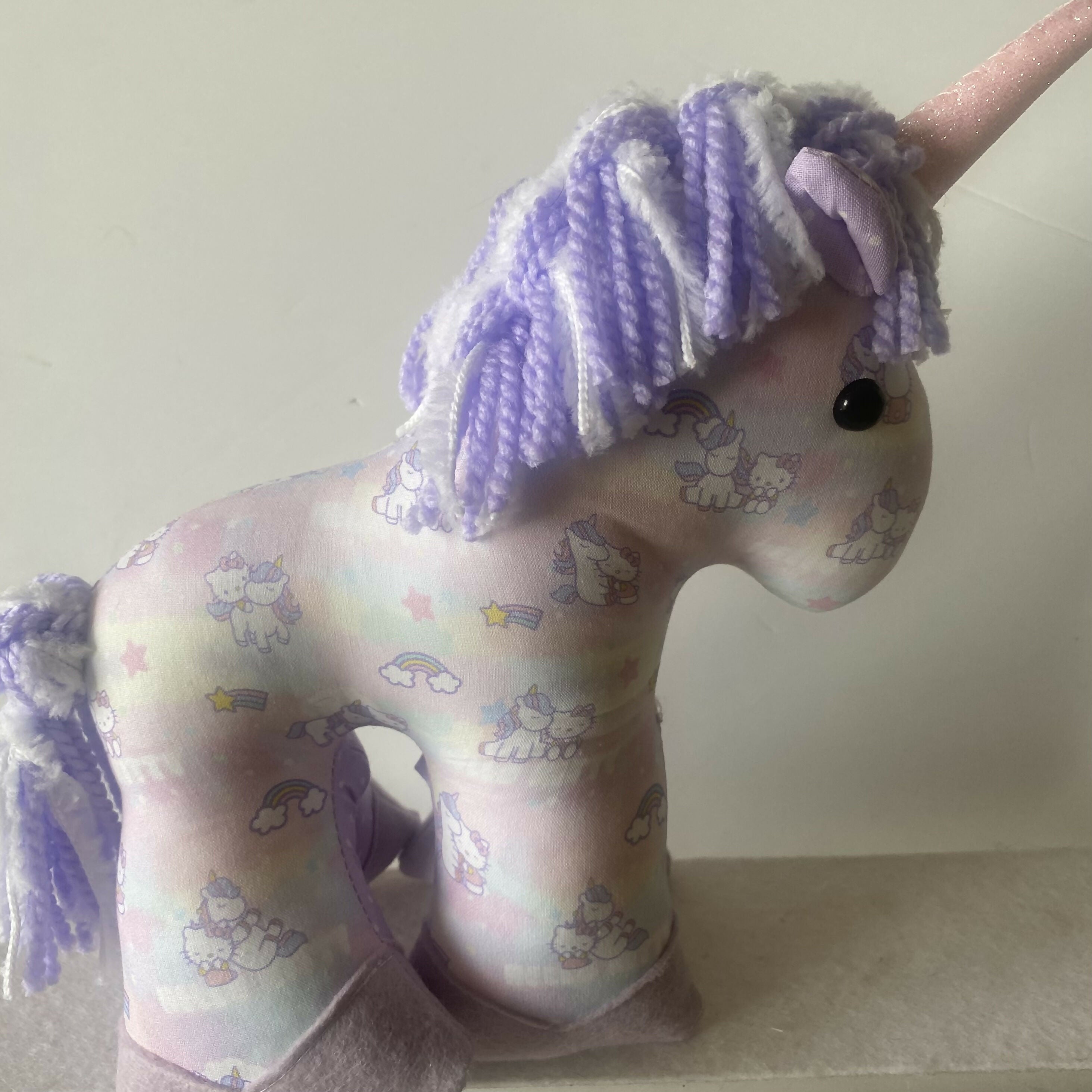 Small lilac and pink unicorn