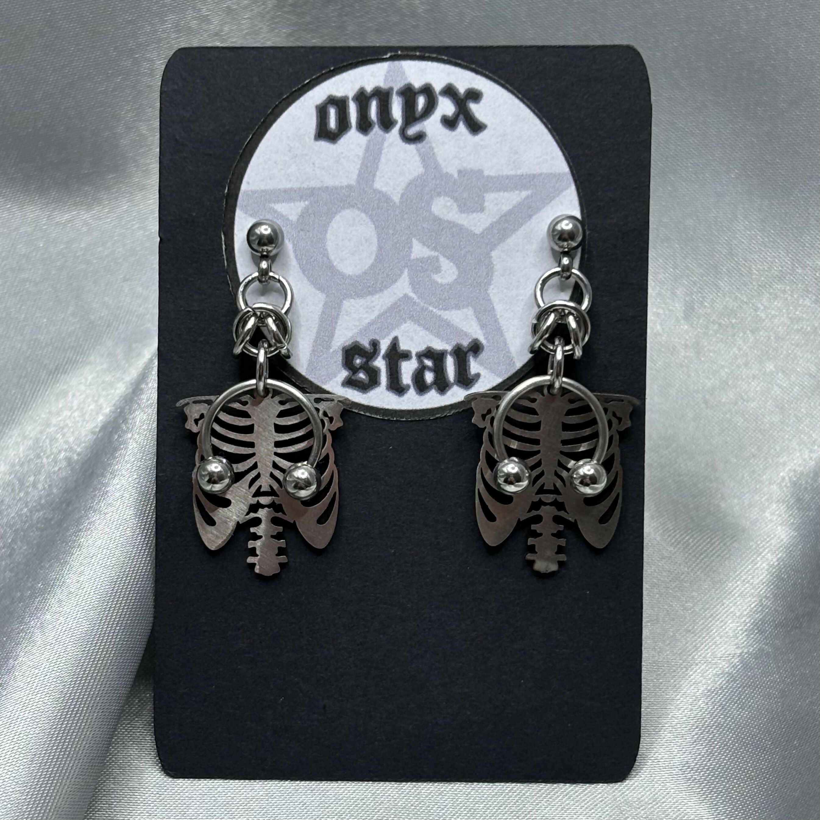 Pierced Skeleton Earrings