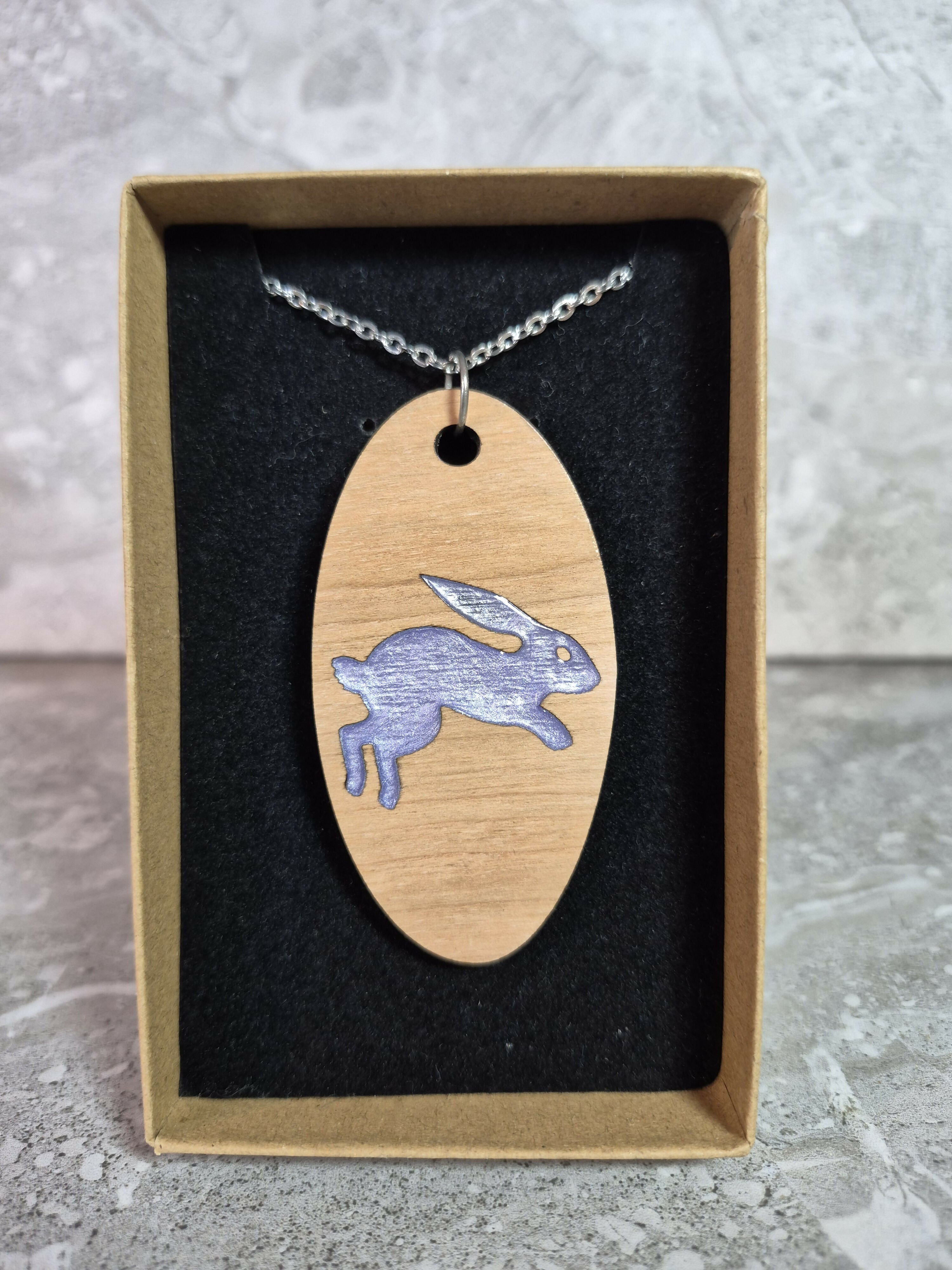 Unique Handcrafted Oval Pendant With An Engraved Leaping Hare