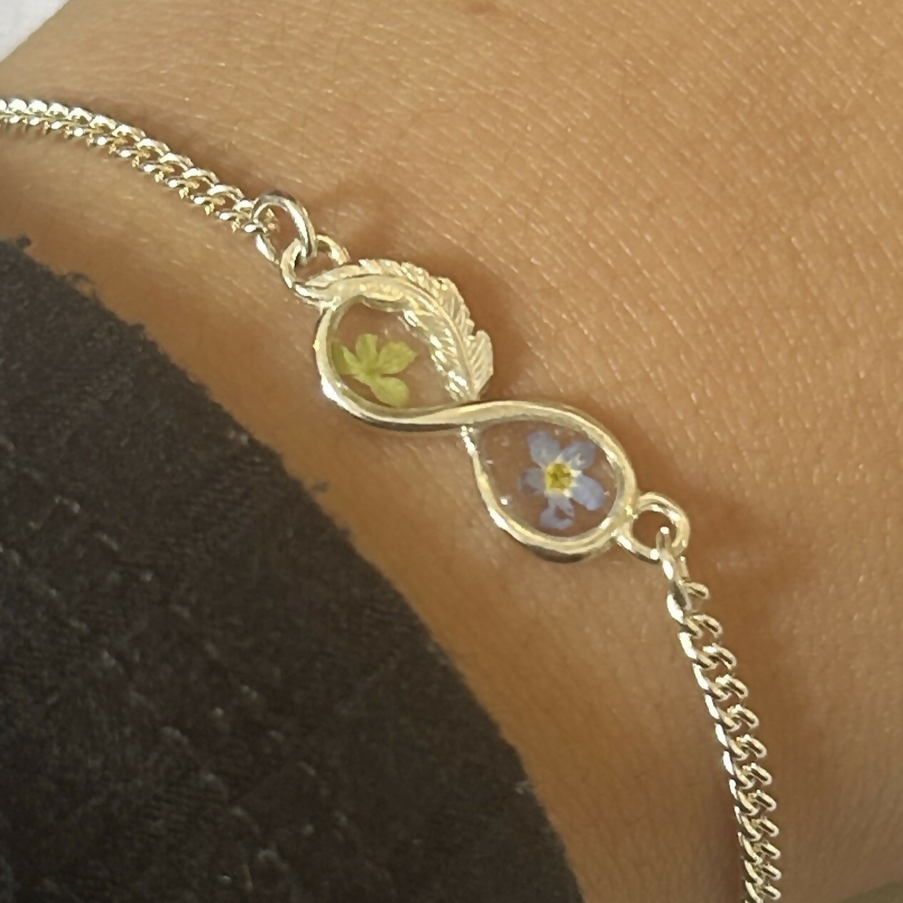 Forget Me Not and Viburnum Infinity Feather Bracelet
