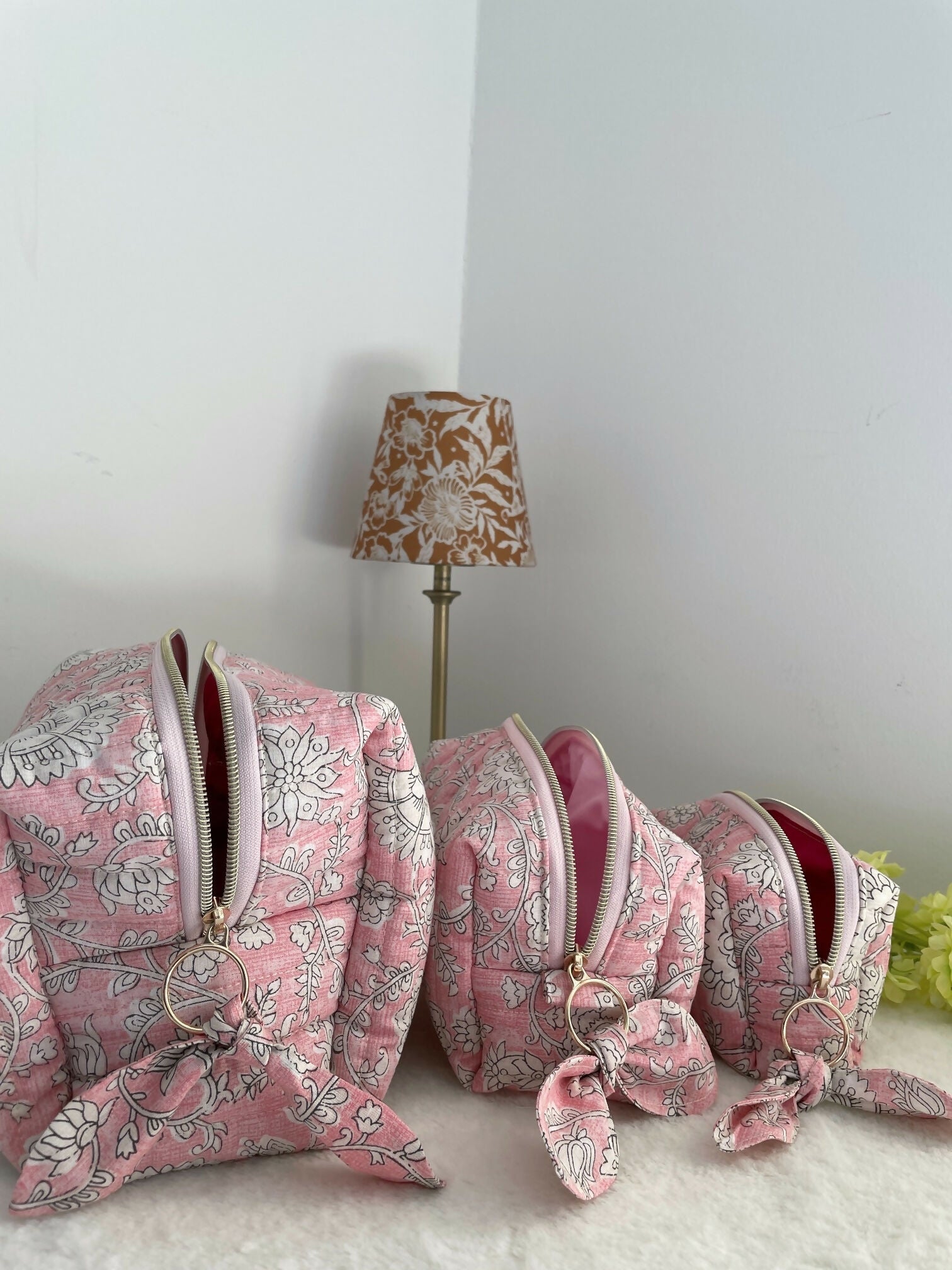 Pink Quilted Toiletry Bag with Zipper with white flower print