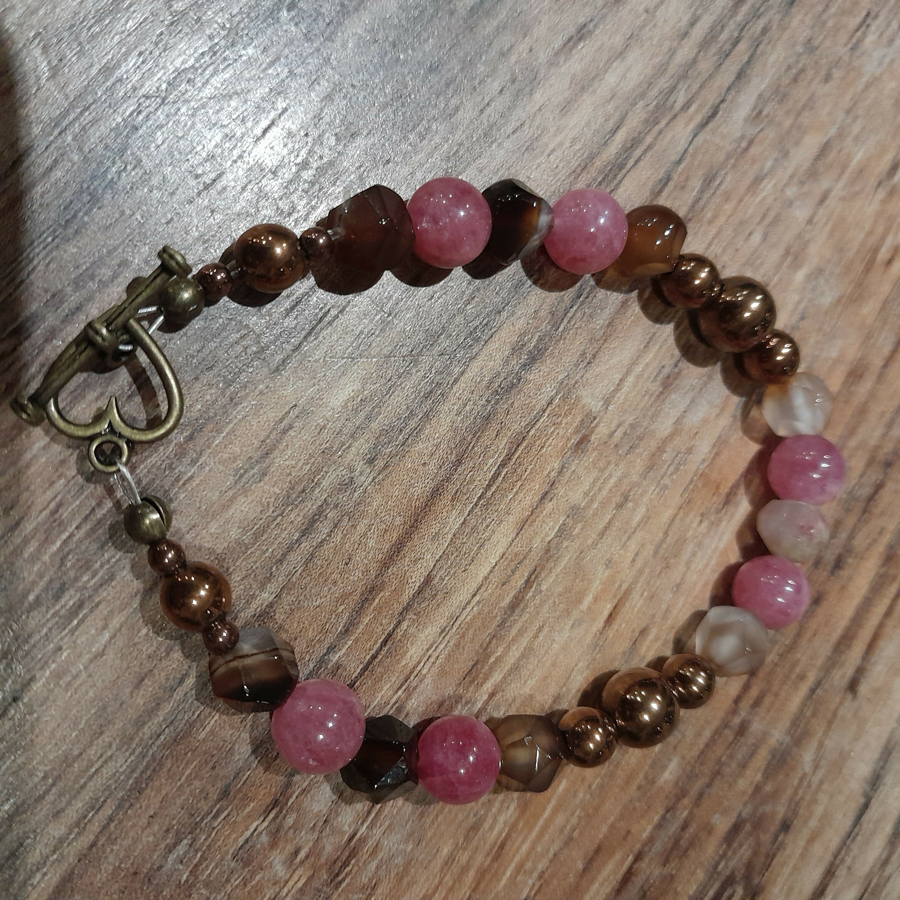 Bronze Toggle Catch Bracelet with Copper Hematite, Faceted Gulf Agate and Strawberry Quartz.