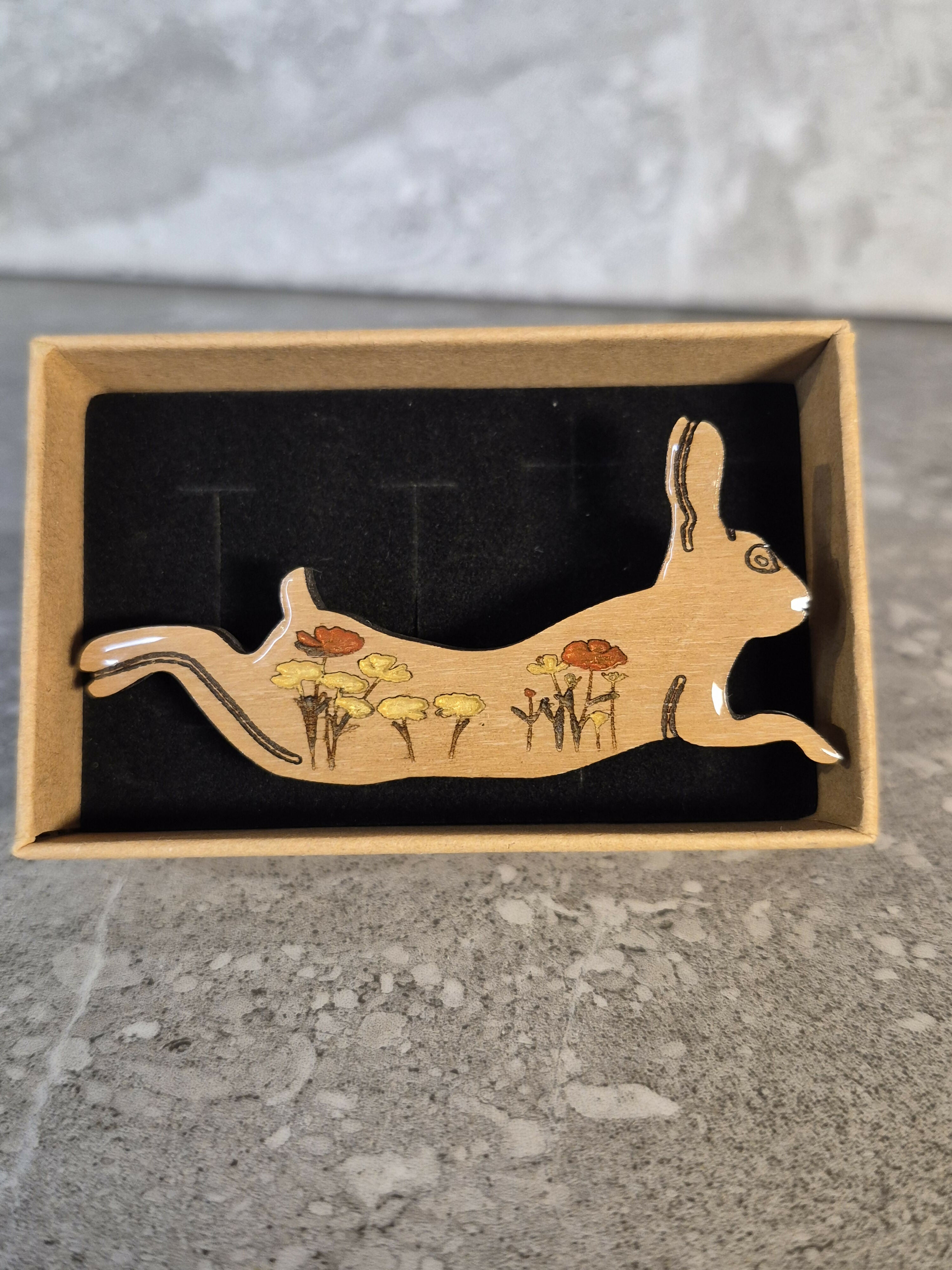 Handcrafted Cherry Veneered Leaping Hare Pin with Flower Decoration