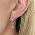 Tiny Silver Cubic Zirconia Star Earrings on a Silver Plated Half Loop Huggie Stud