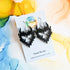 Handmade Black Horned Hearts Resin Earrings