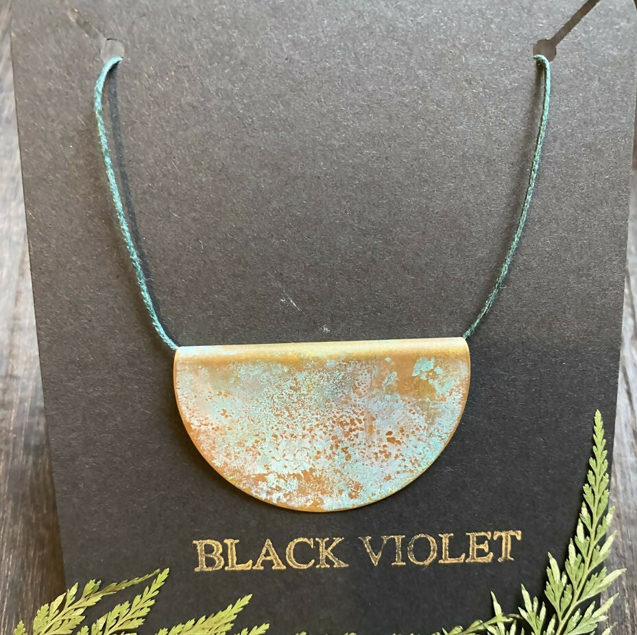 BRASS PATINA NECKLACE ON WAXED COTTON CORD
