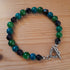 Tibetan Silver Toggle Catch Bracelet with Faceted Navy Goldstone, Blue Chrysocolla & Green Agate.