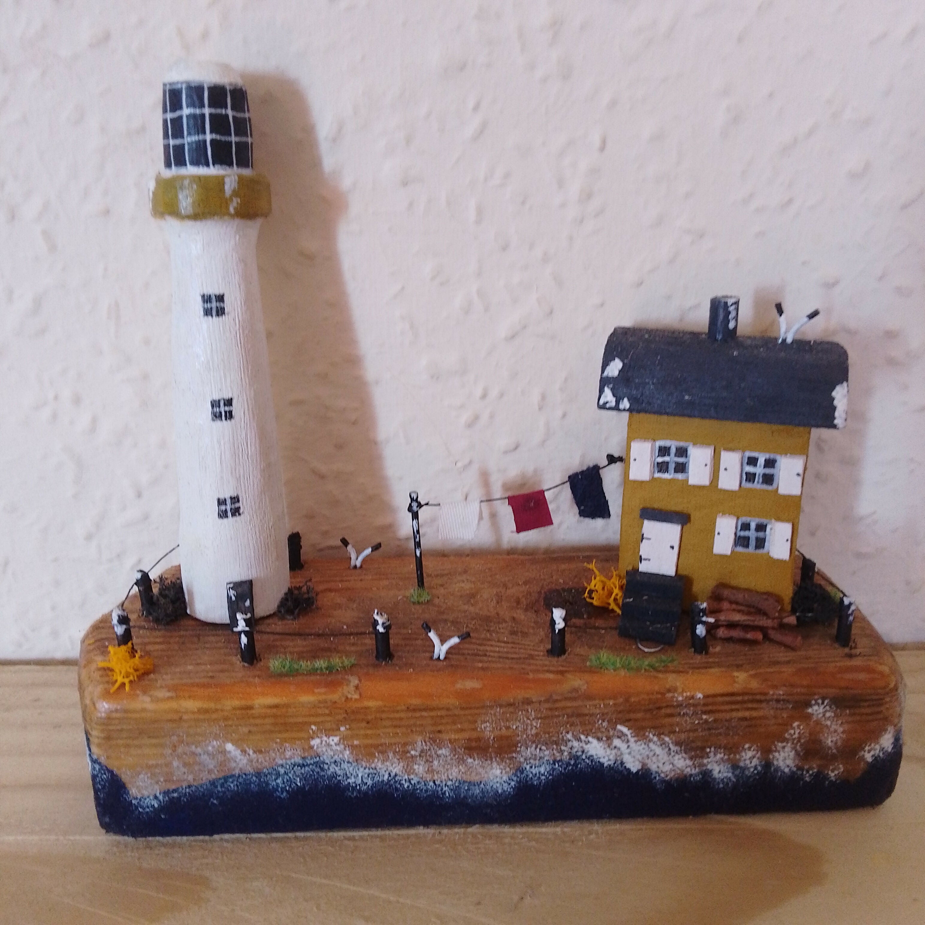 Lighthouse And Cottage/Washing Line