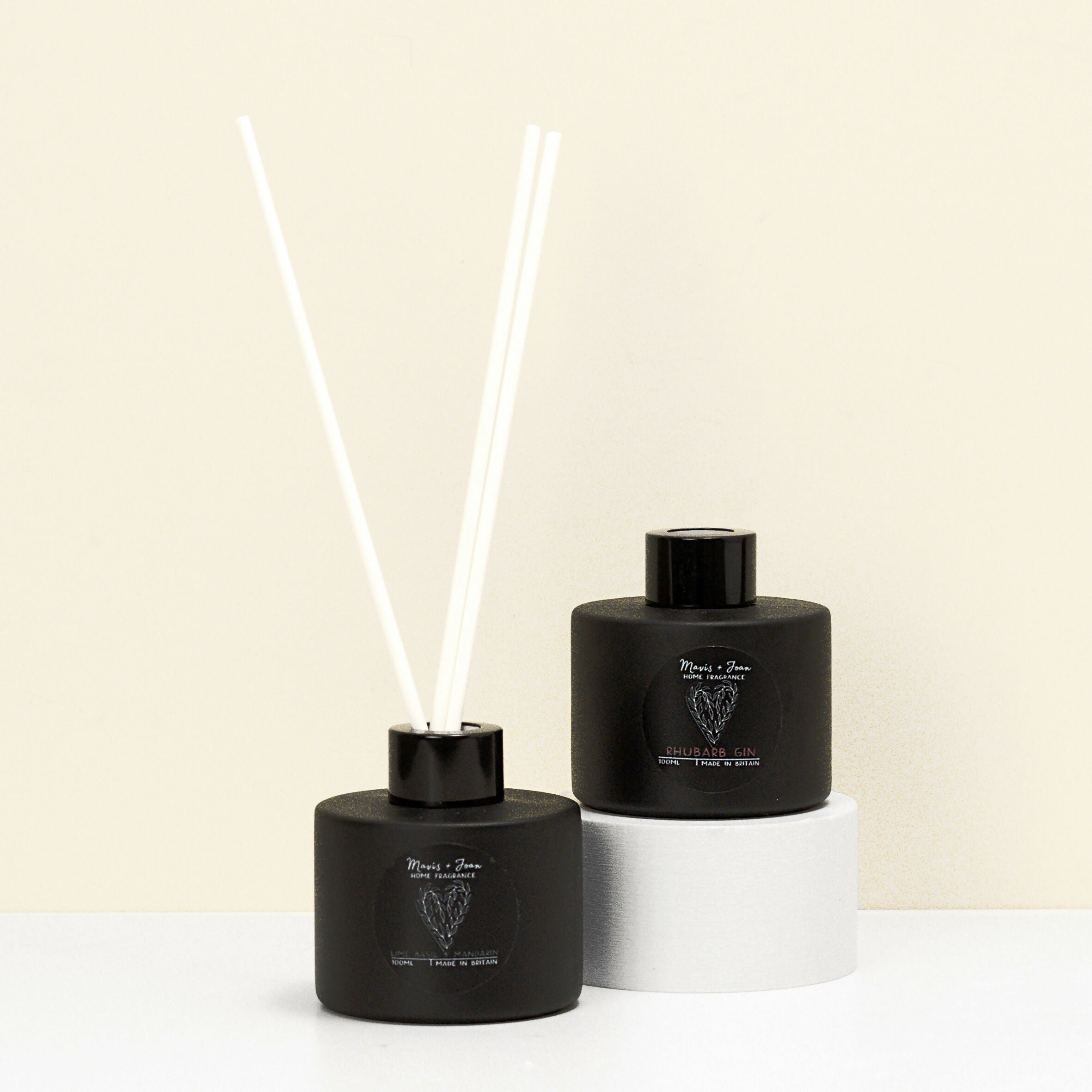 Reed Diffuser with black glass bottle and white reeds