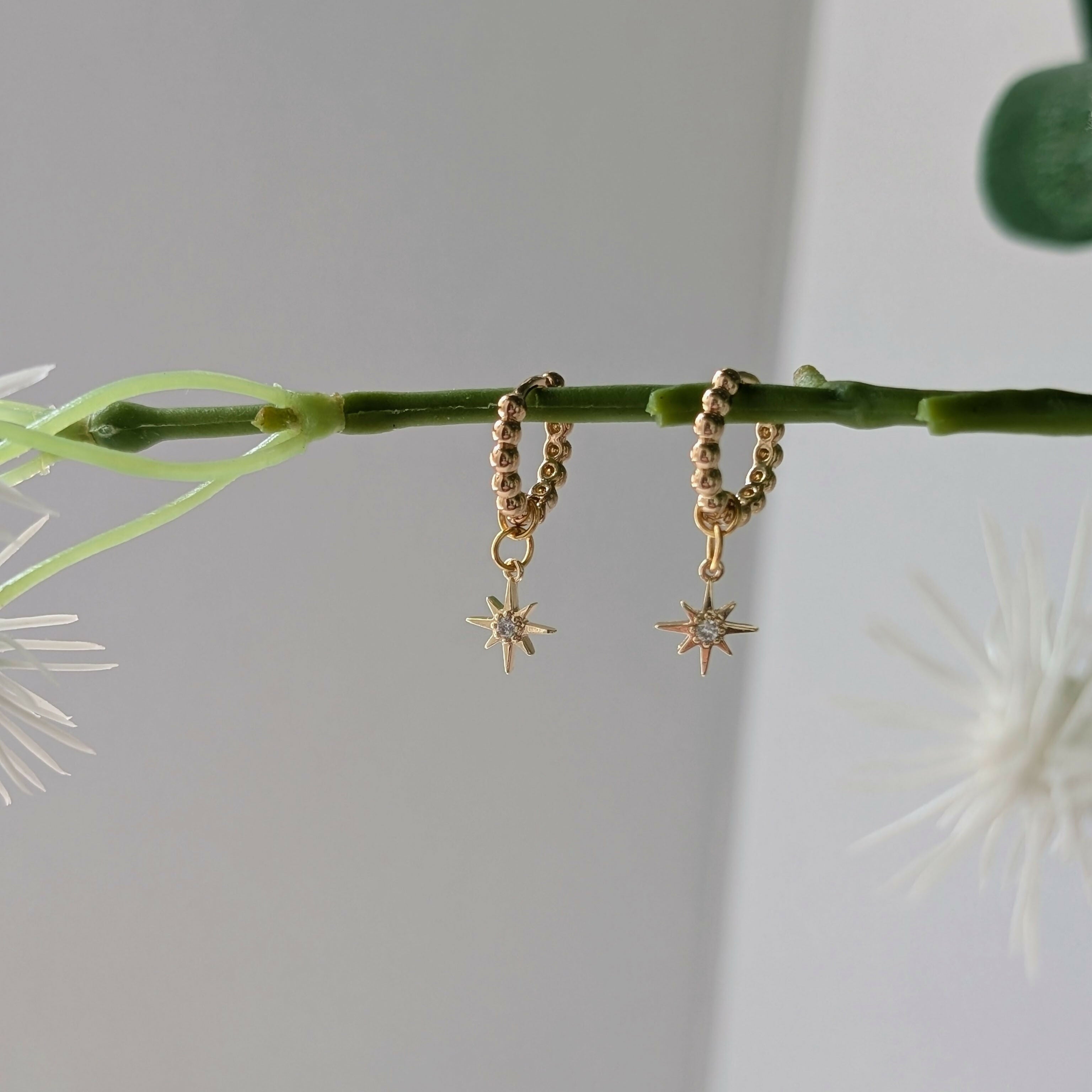 Gold Plated Bead Huggie Earrings with a Tiny Gold Cubic Zirconia Star Charm