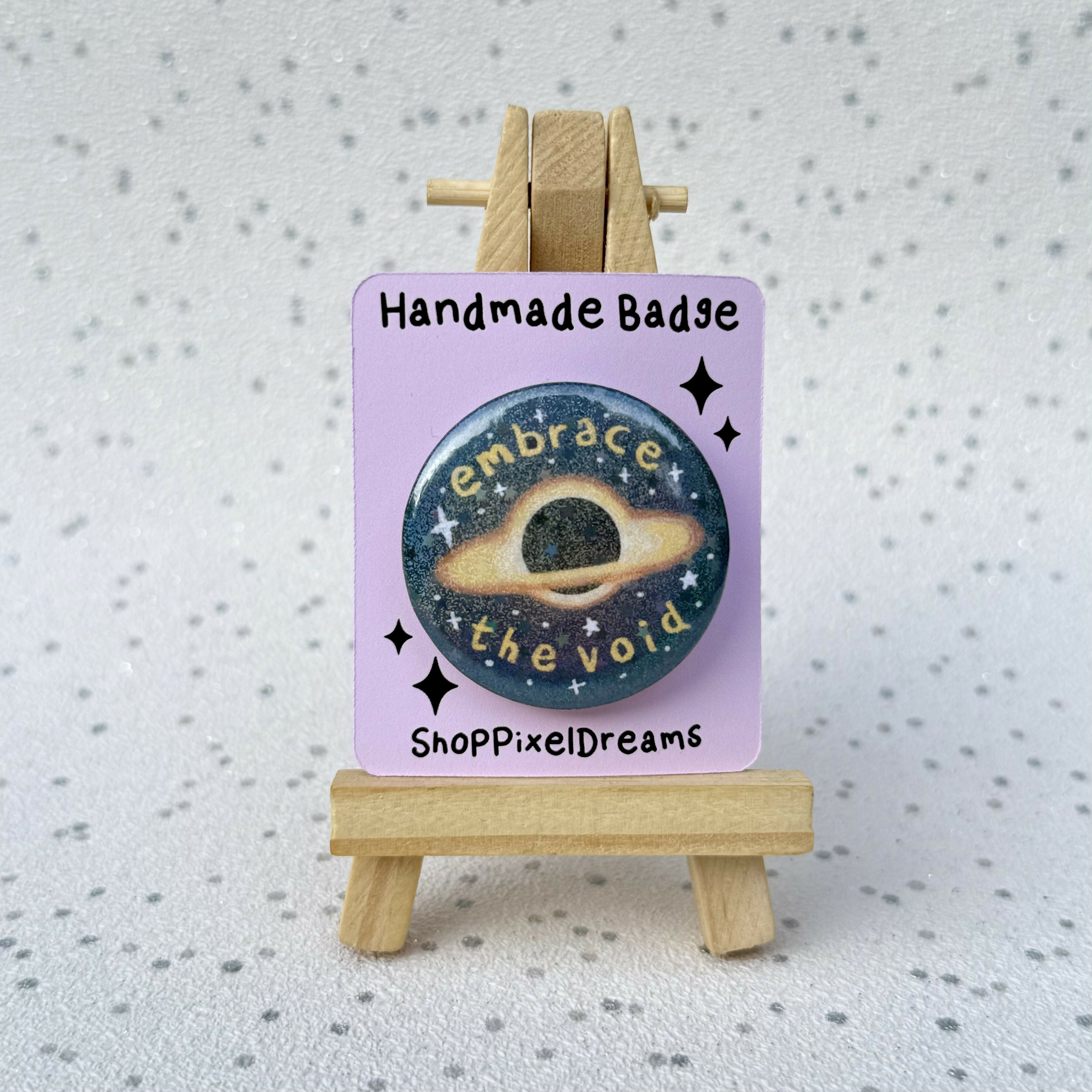 Embrace the Void Black Hole Sparkly Holographic Pin Badge