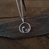 Handmade Silver Swirl Necklace With Garnet