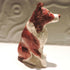Ceramic border collie dog sculpture, red