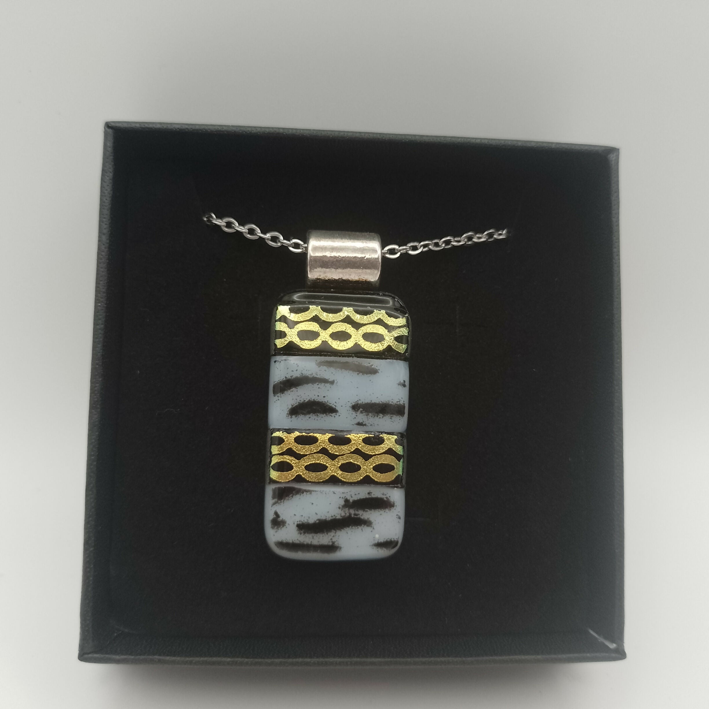 Gold and Black and White Pendant