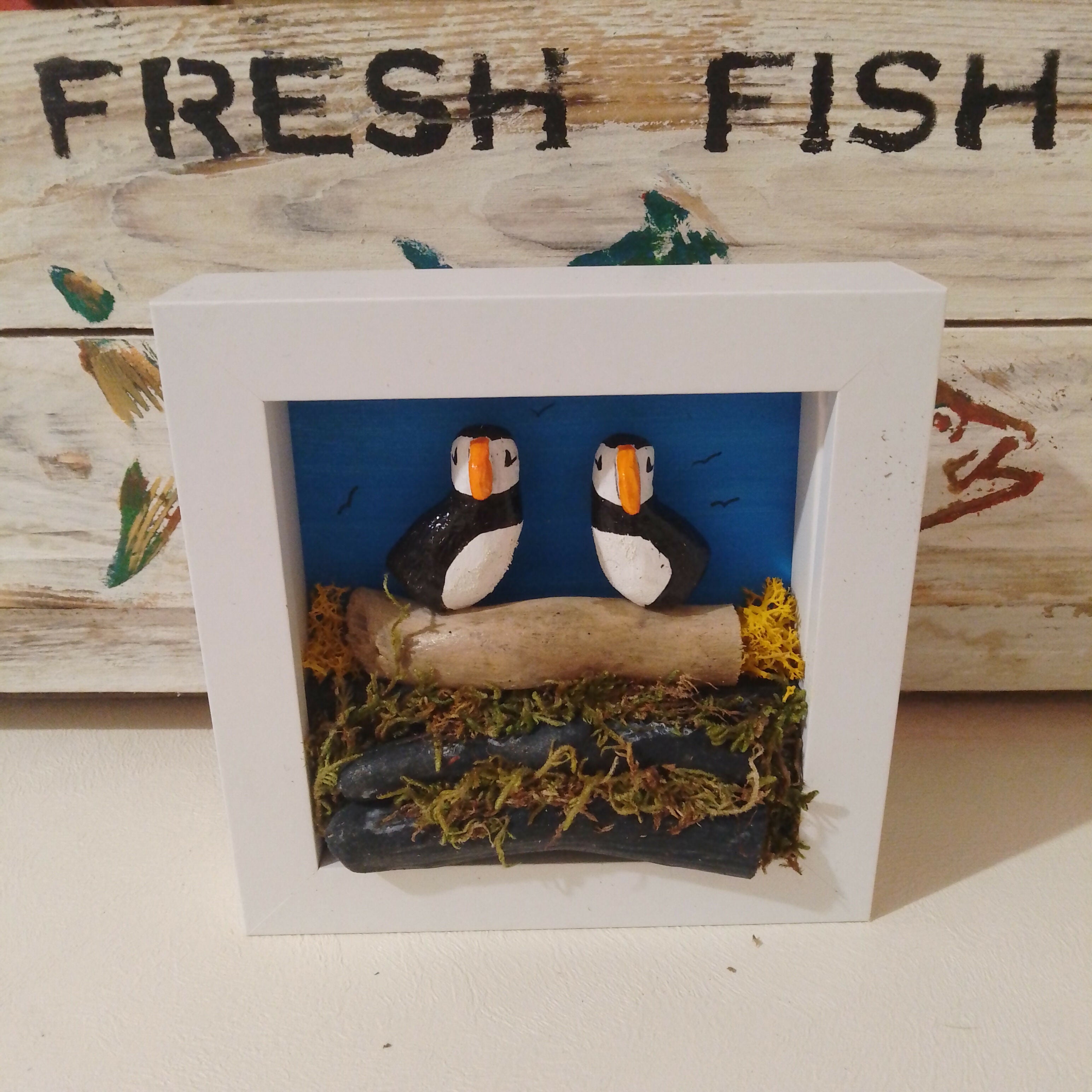 2 Puffins In Frame, Sky Blue Background