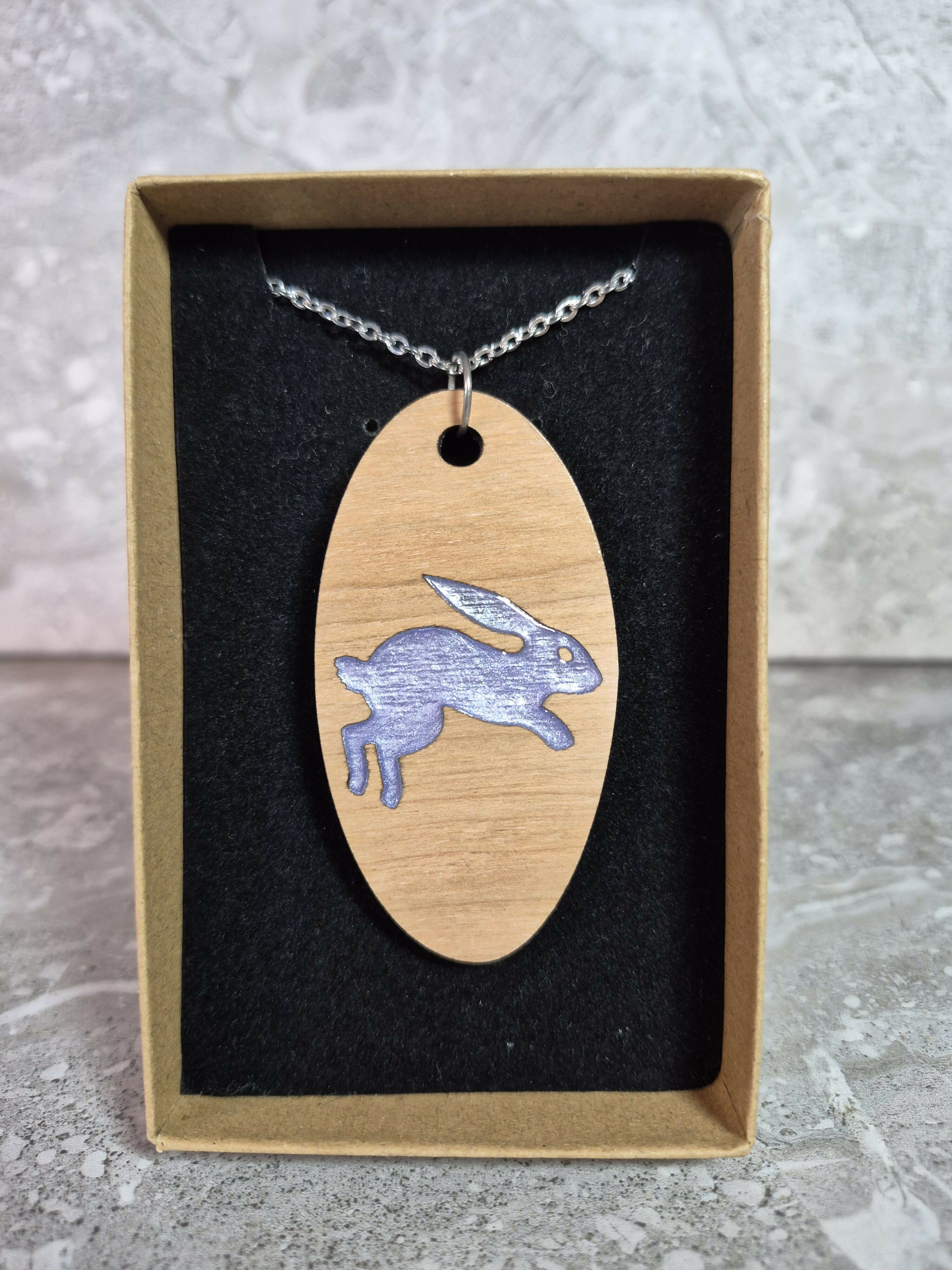 Unique Handcrafted Oval Pendant With An Engraved Leaping Hare