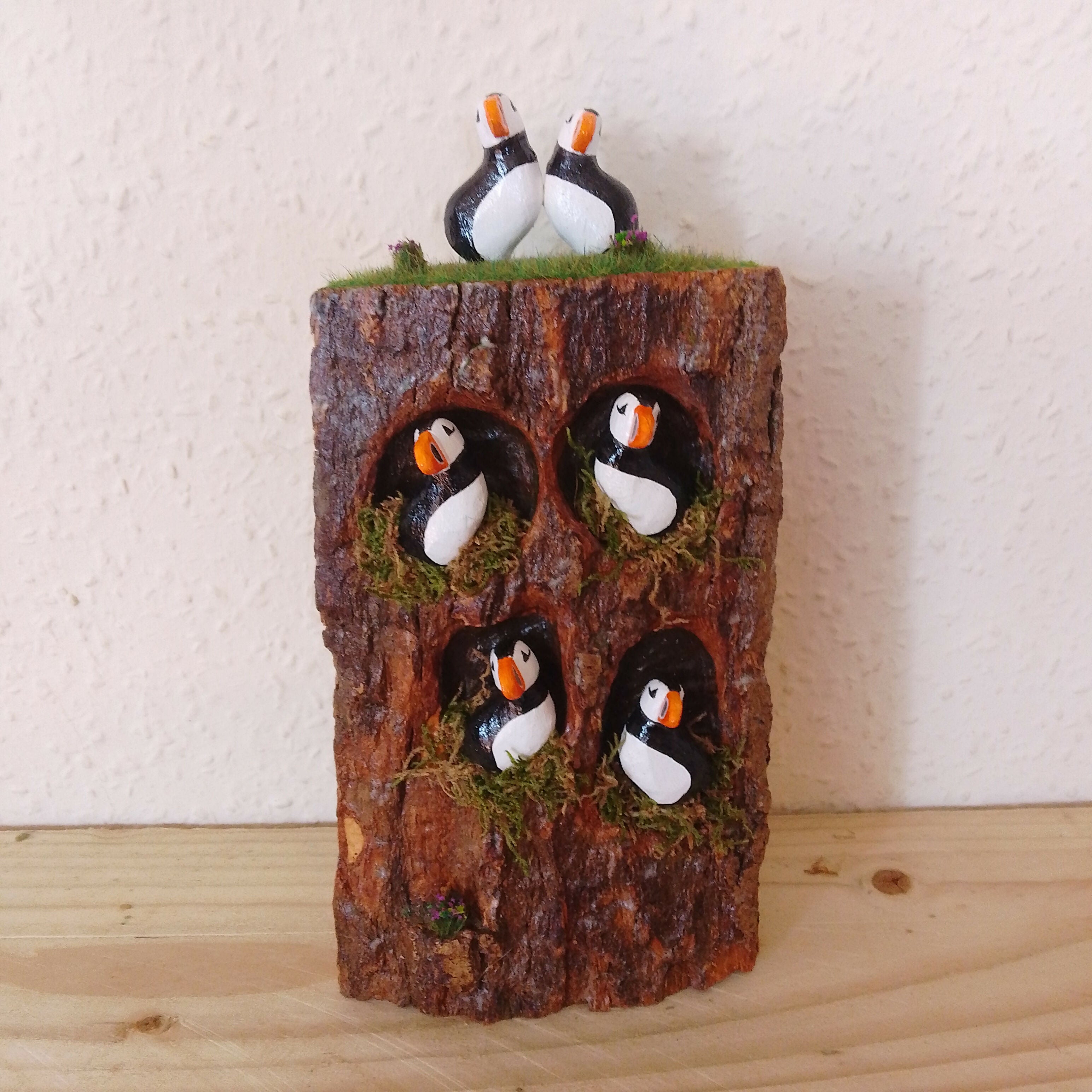 Six Puffins On Wood