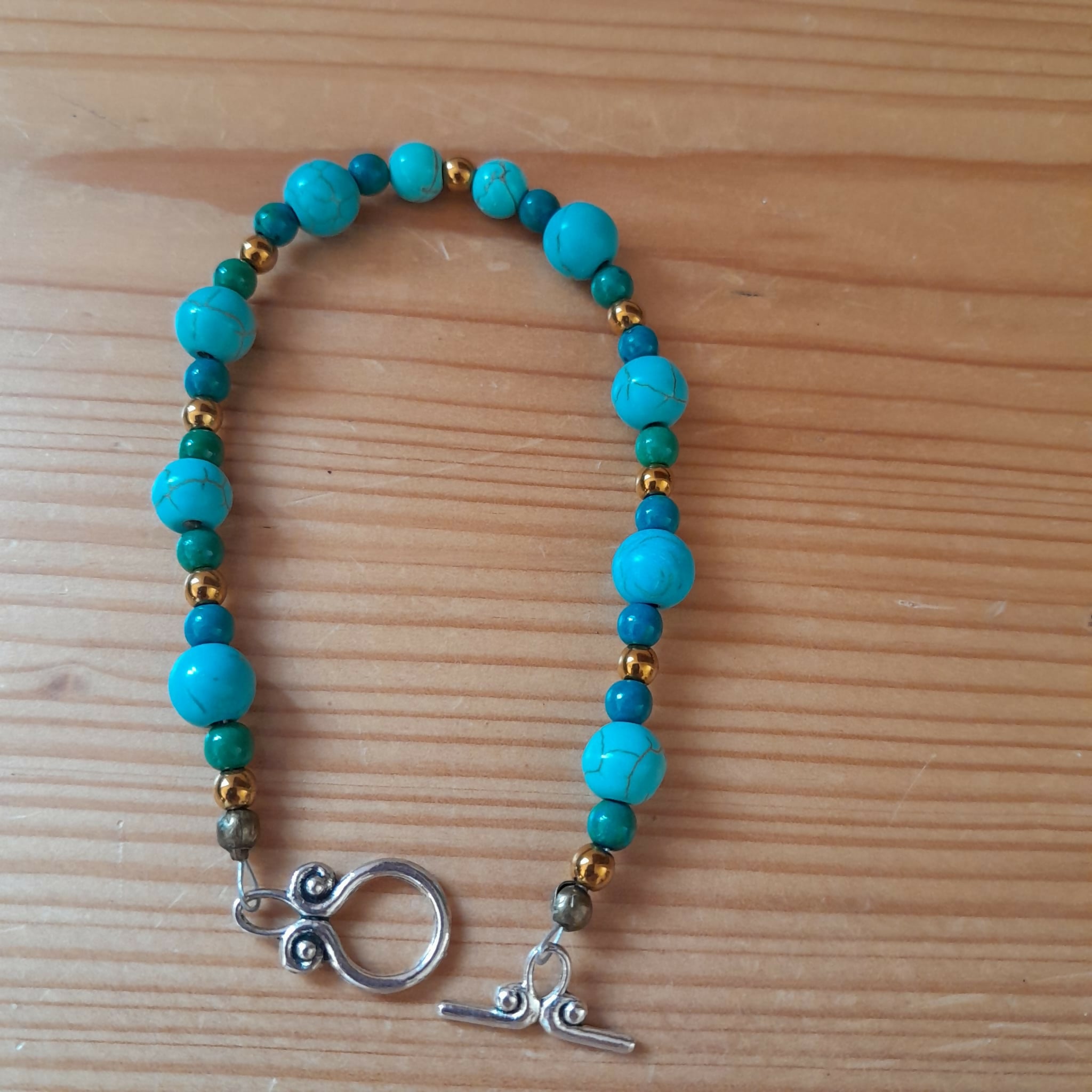 Tibetan Silver Toggle Catch Bracelet with Bronze Hematite, Chrysocolla and Turquoise.