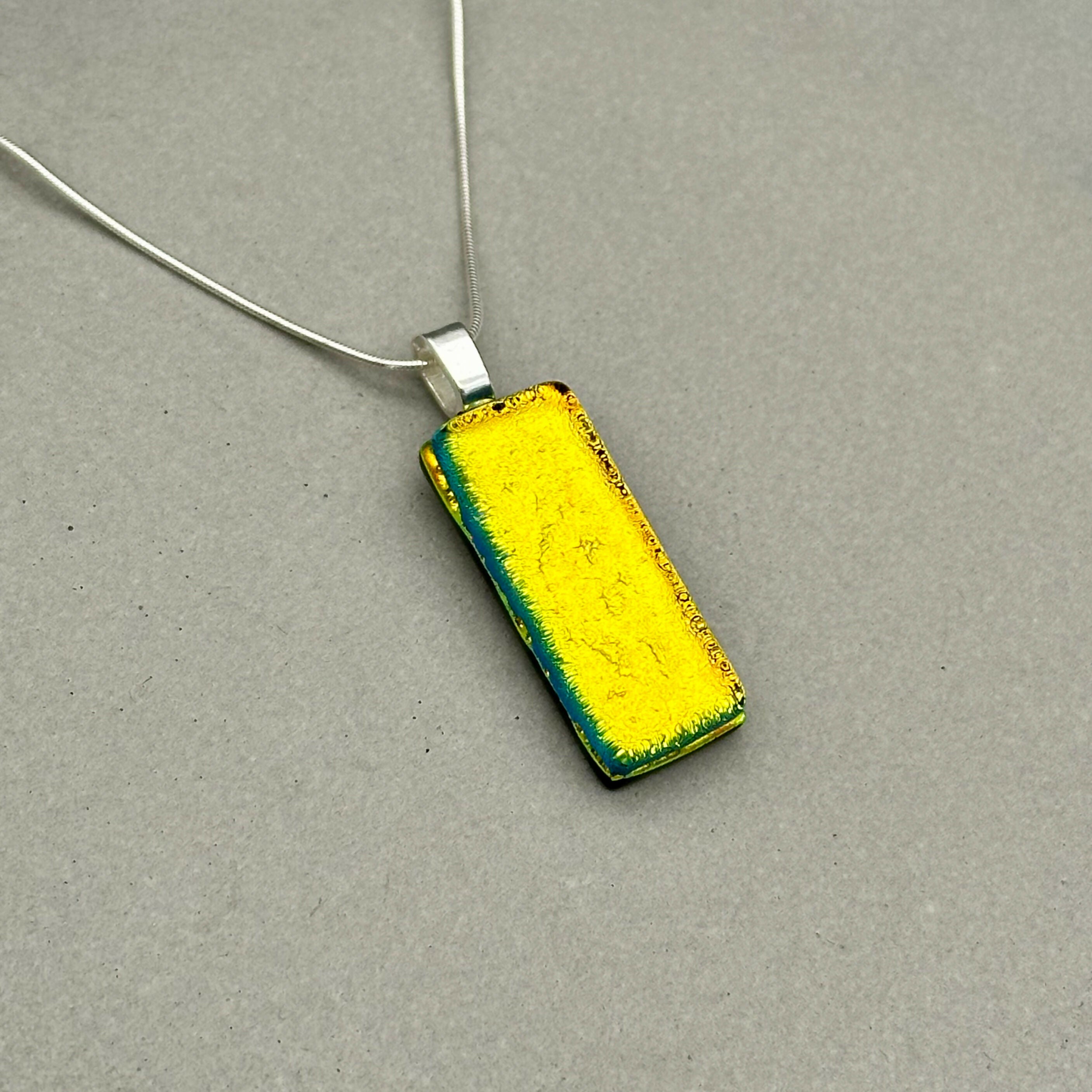 Orange Dichroic Fused Glass Pendant with Silver Plated Chain - Handmade by Jade Tapson Glass.