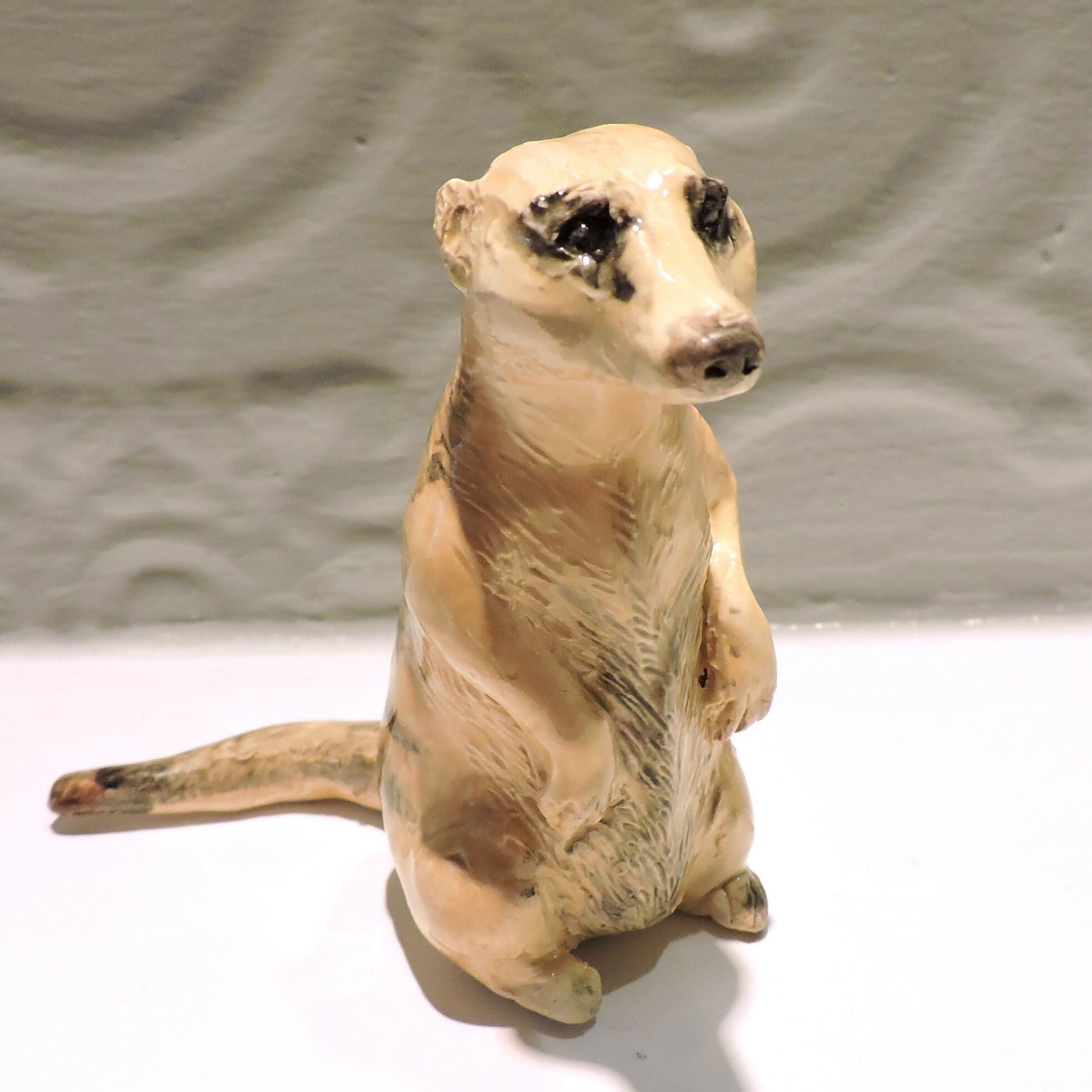 Ceramic Meerkat sculpture