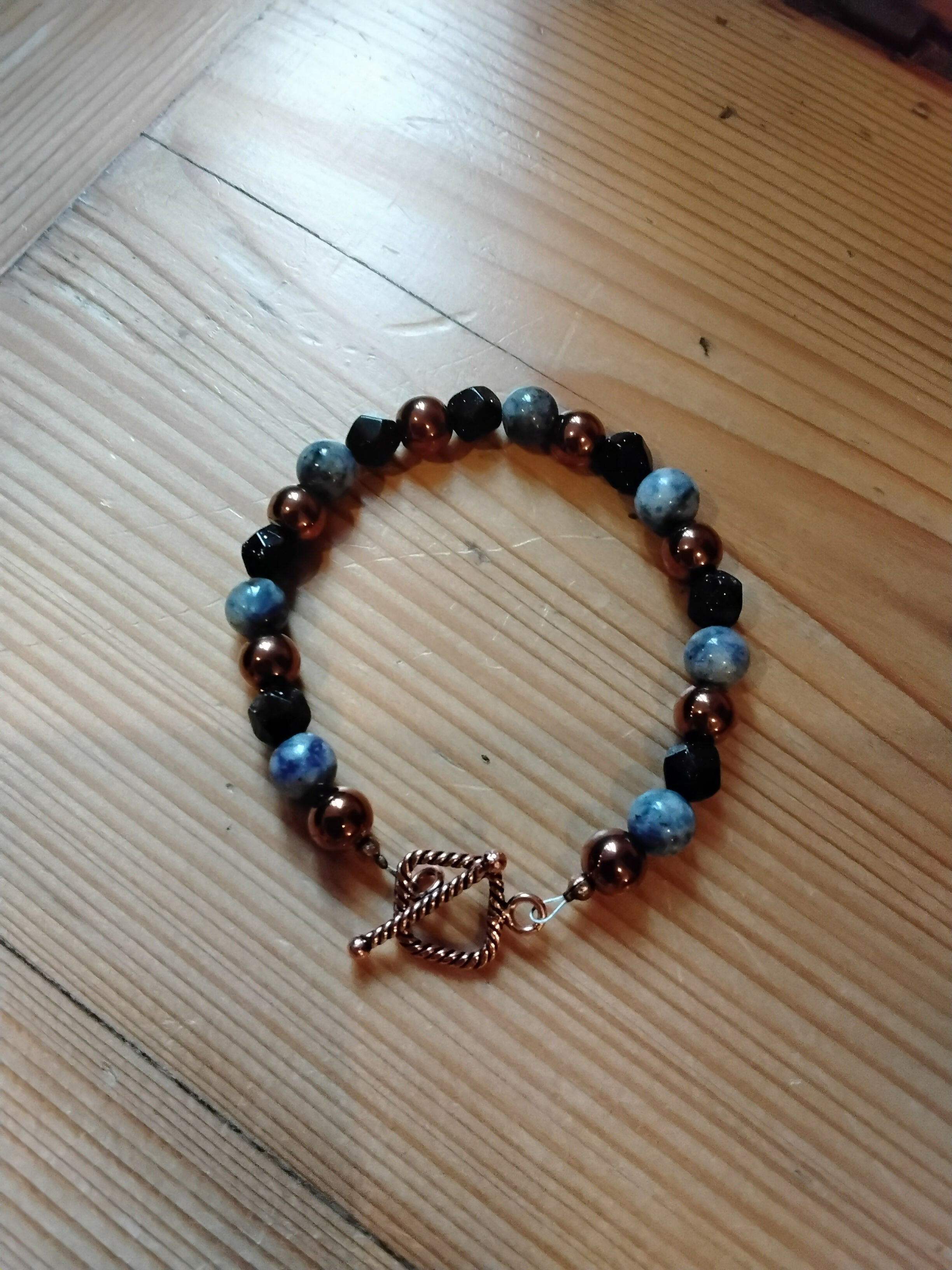 Pure Copper Toggle Catch Bracelet with Copper Hematite, Blue Spot Jasper and Faceted Navy Goldstone.