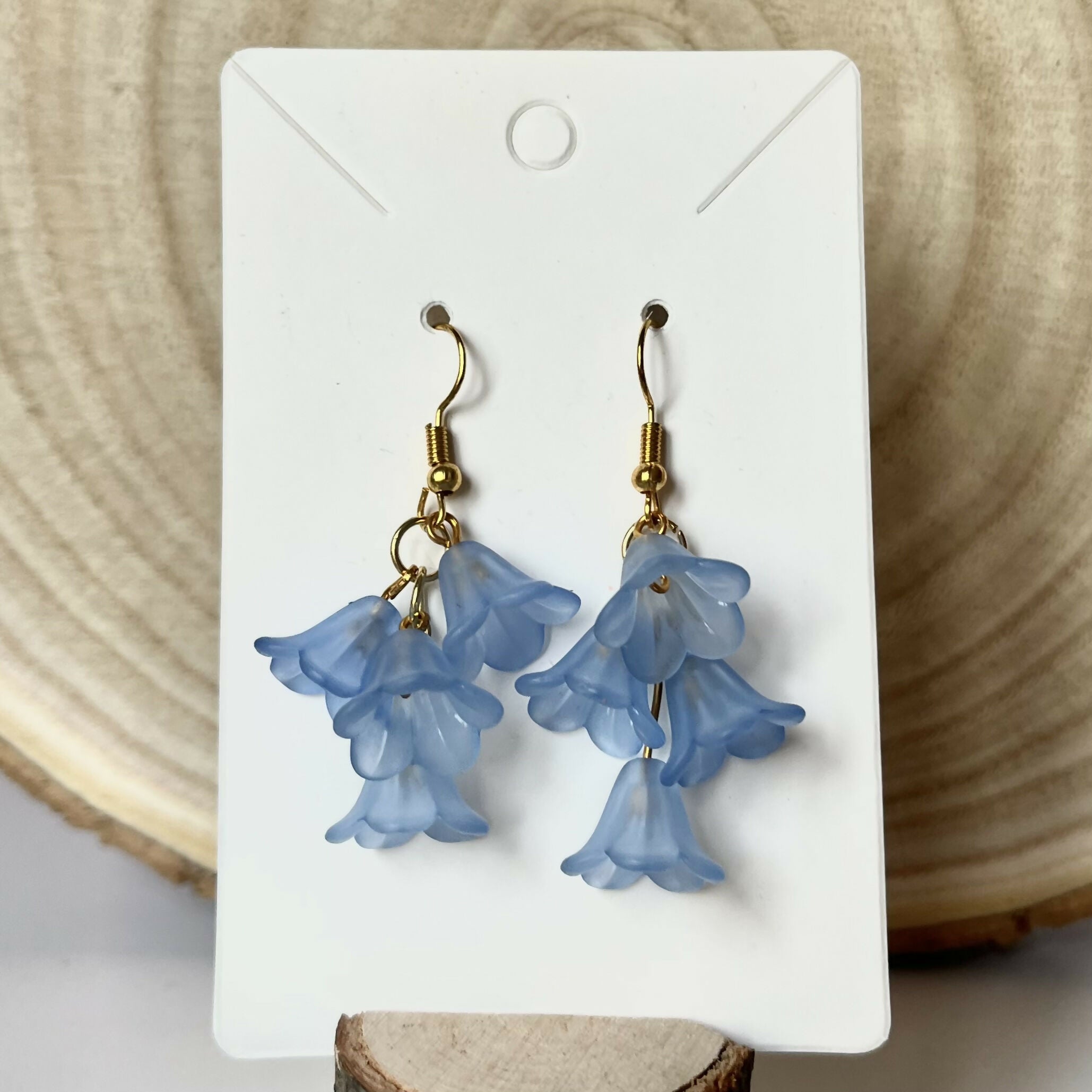Cascading Blue Flower Earrings In Gold