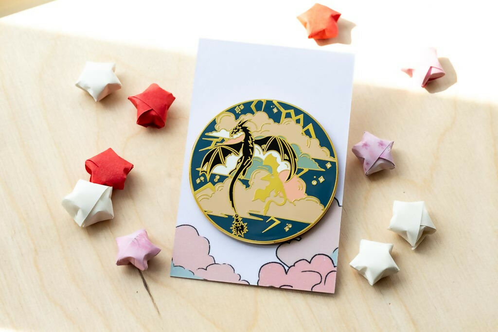 Wings in the Storm Enamel Pin