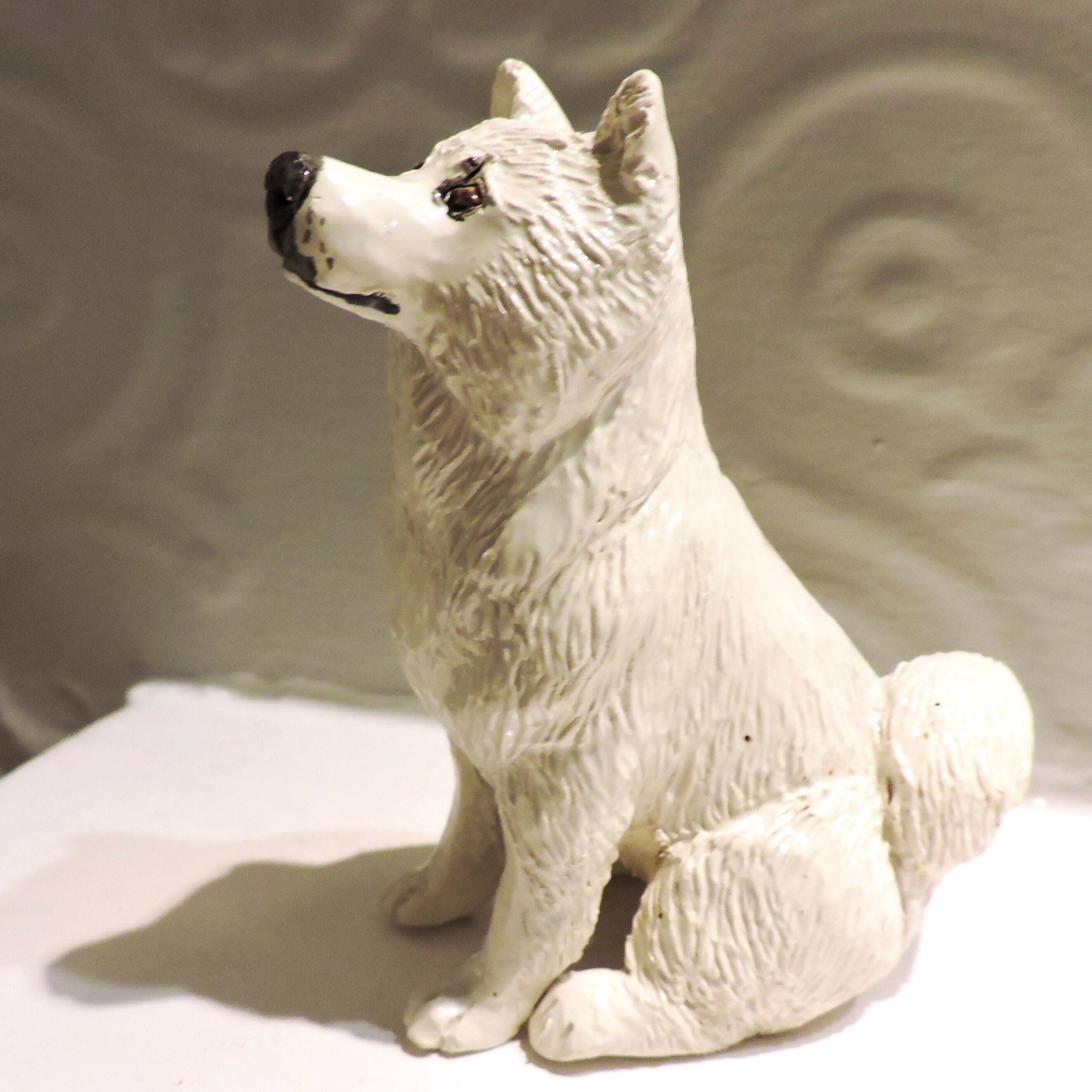 Ceramic Samoyed dog sculpture