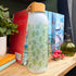 Rainforest Leaves - 25oz Glass Water Bottle with Bamboo Lid