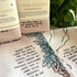 Queen Helmet & Pelican Shells Compendium Tea Towel