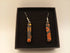 Orange Cogs on Black Earrings