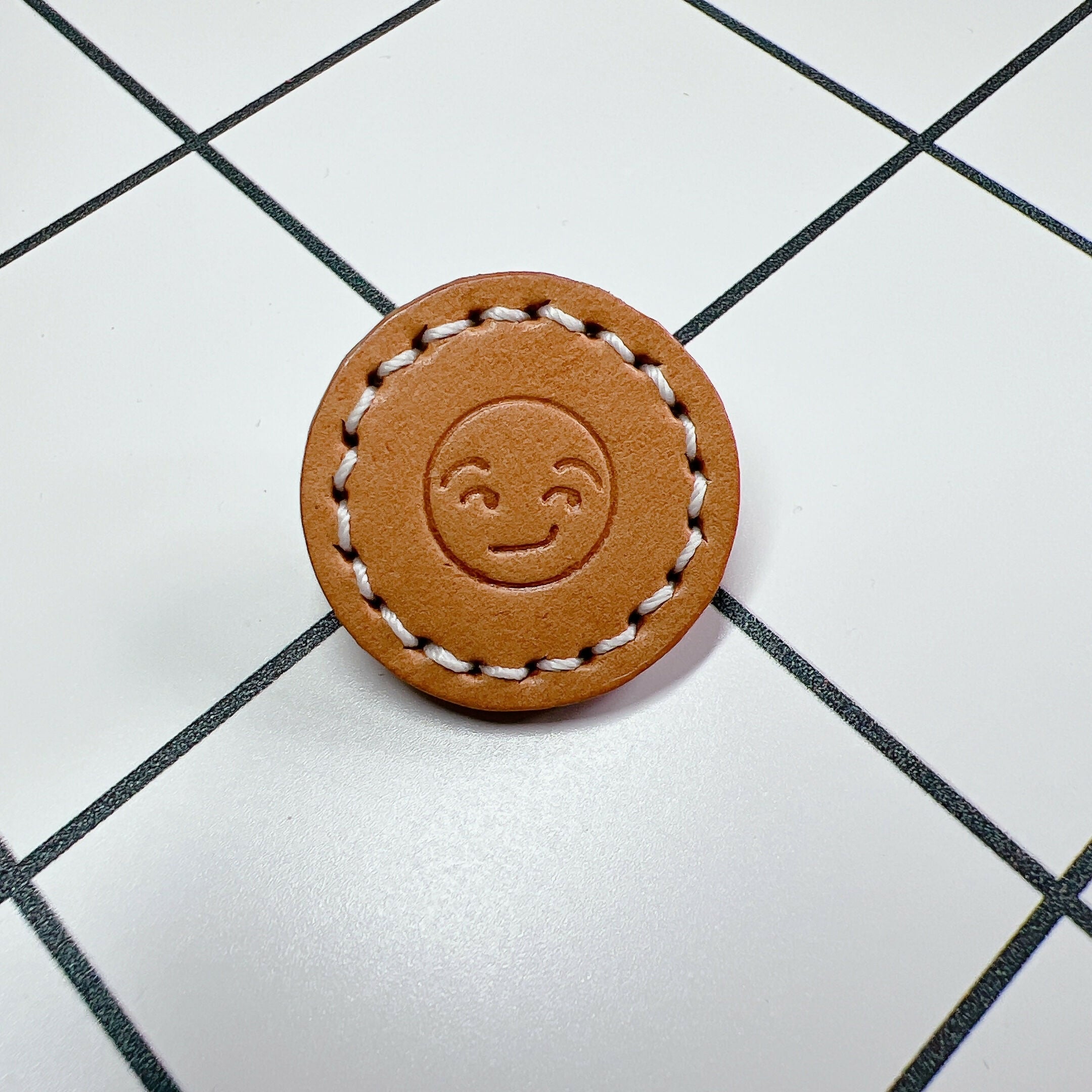 Embossed Emoji Leather Pin - Smirking Face (30 mm)