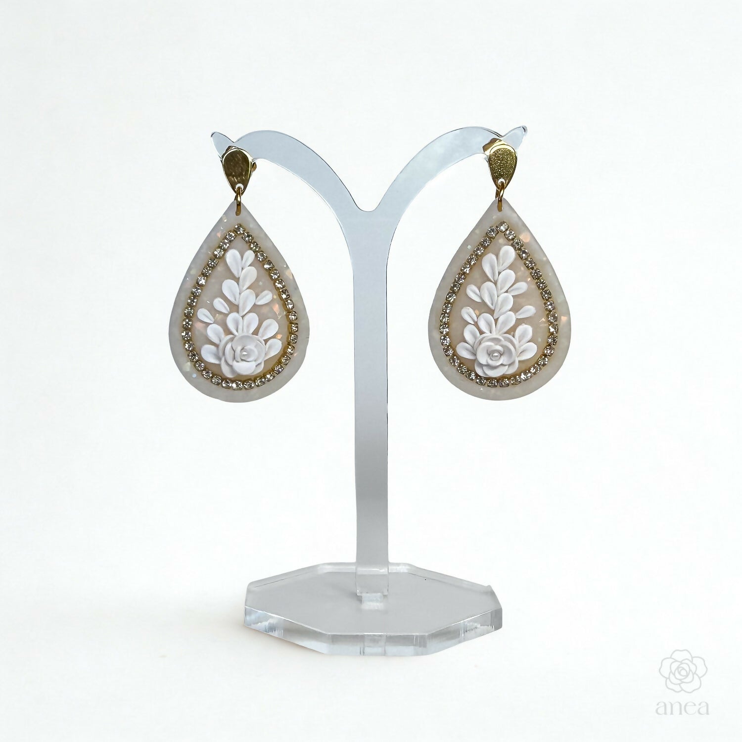 Floral Teardrop Earrings with Rhinestone Detail in Opal
