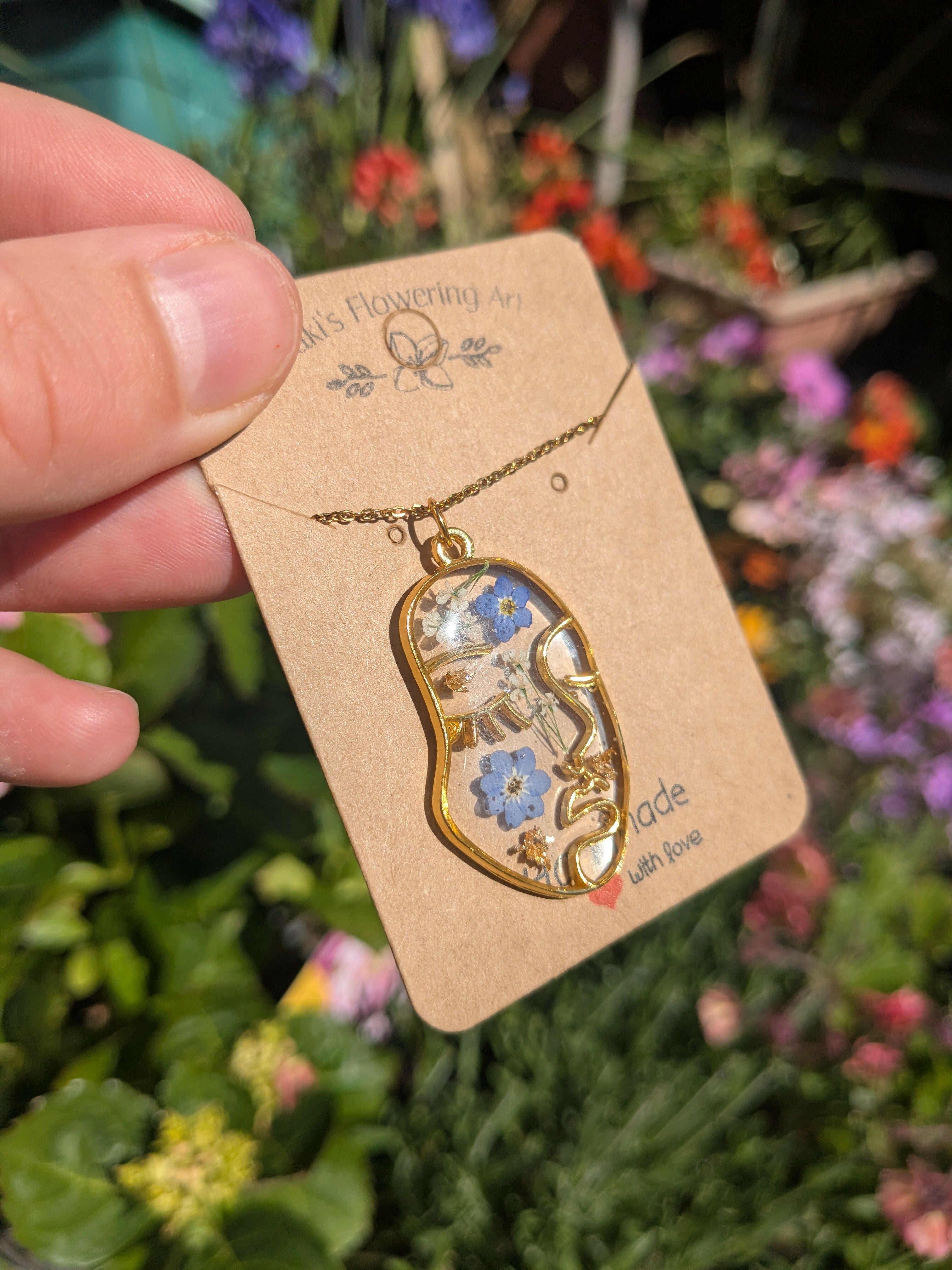 FORGET ME NOT LADY FACE NECKLACE