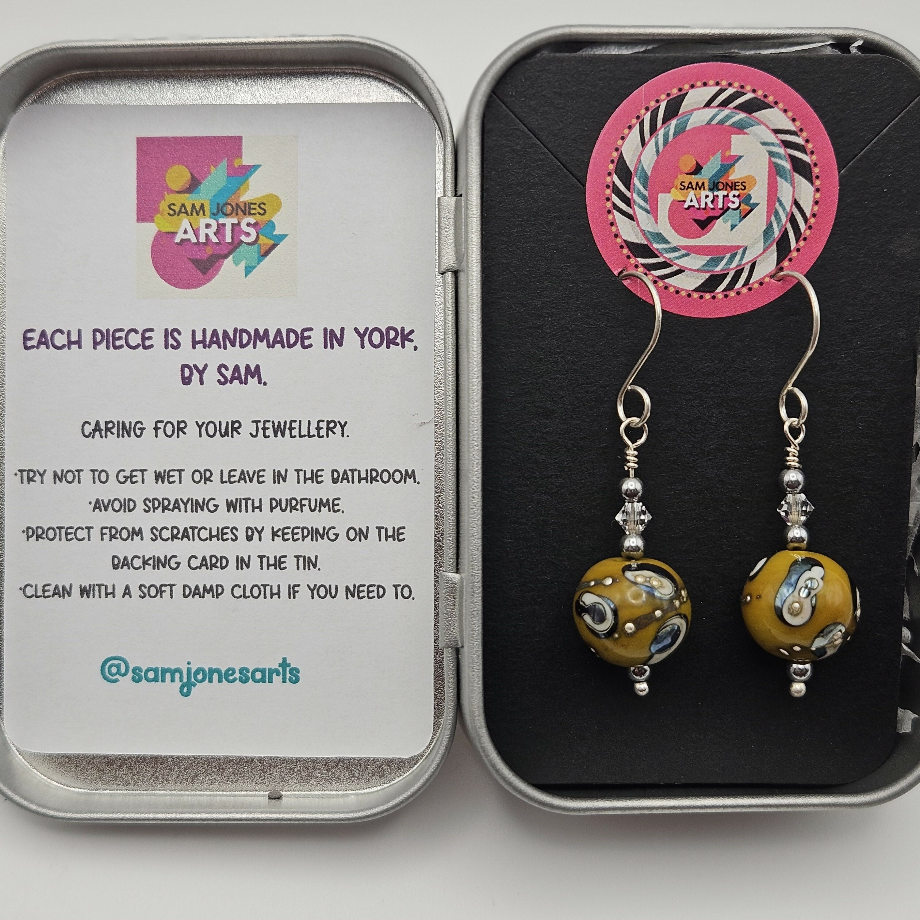 HAND LAMPWORKED GLASS SPHERE EARRINGS, WITH STERLING SILVER AND SWAROVSKI CRYSTALS.