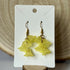 Cascading Yellow Flower Earrings In Gold